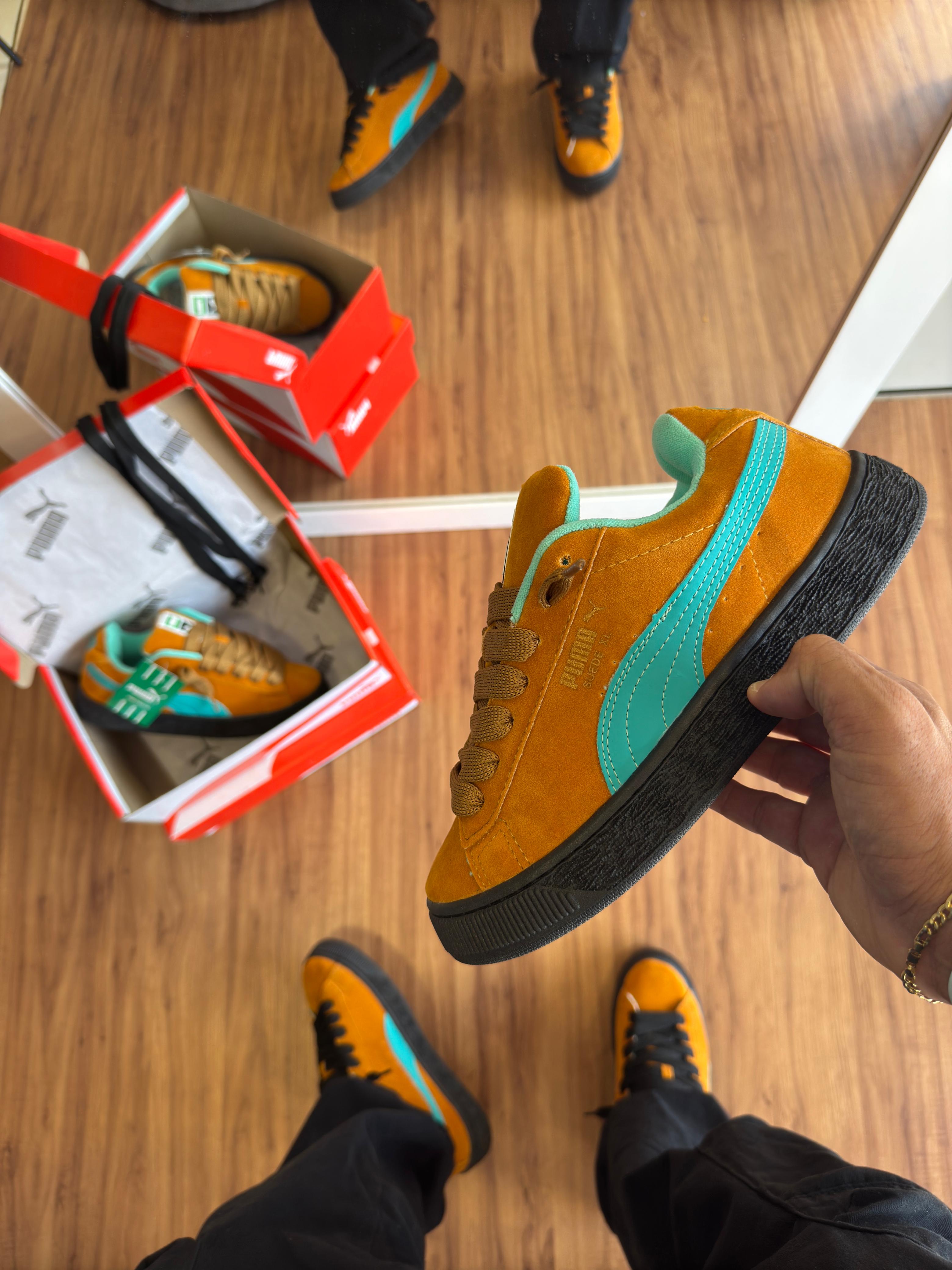 #097 Puma Suede  caramelo e preto, disponível 38 ao 43 R$239,90