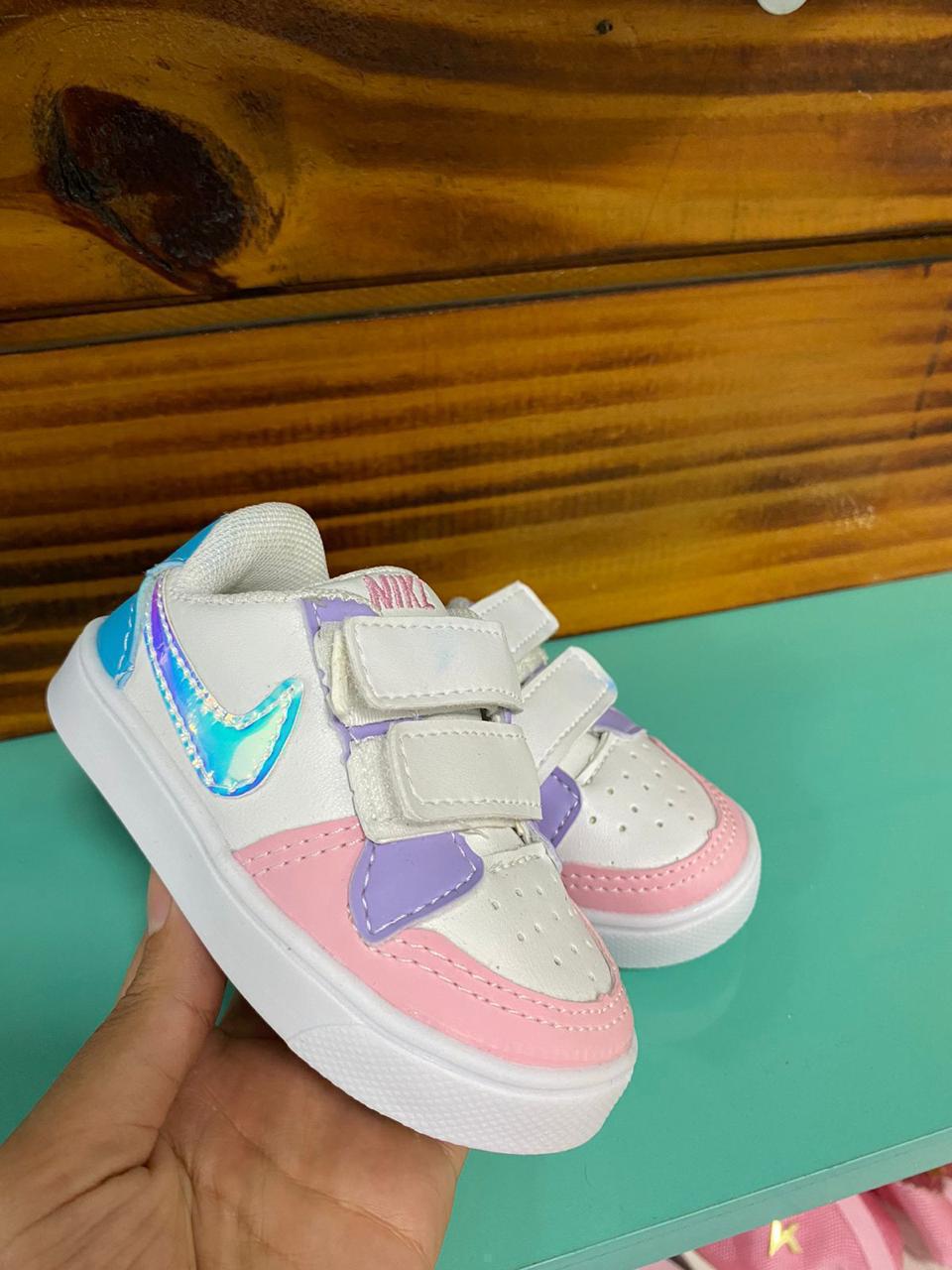#102 Nike linha baby infantil, disponível do 18 ao 25 R$134,90