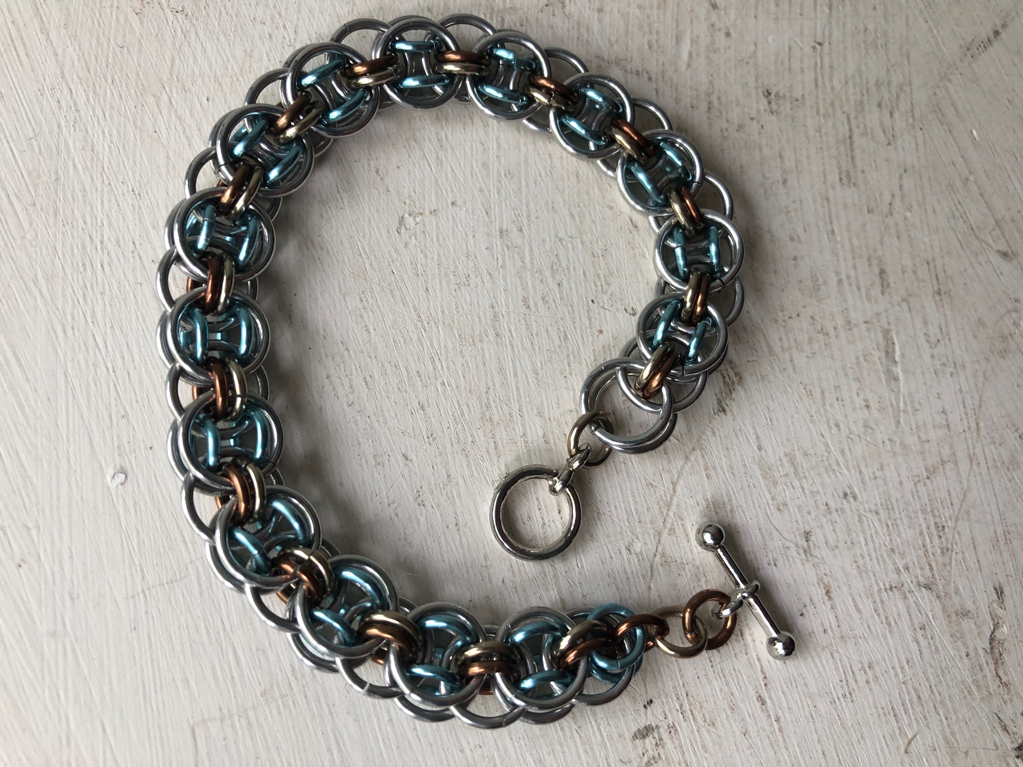 Silver, Sky Blue, and Bronze Chainmaille Bracelet