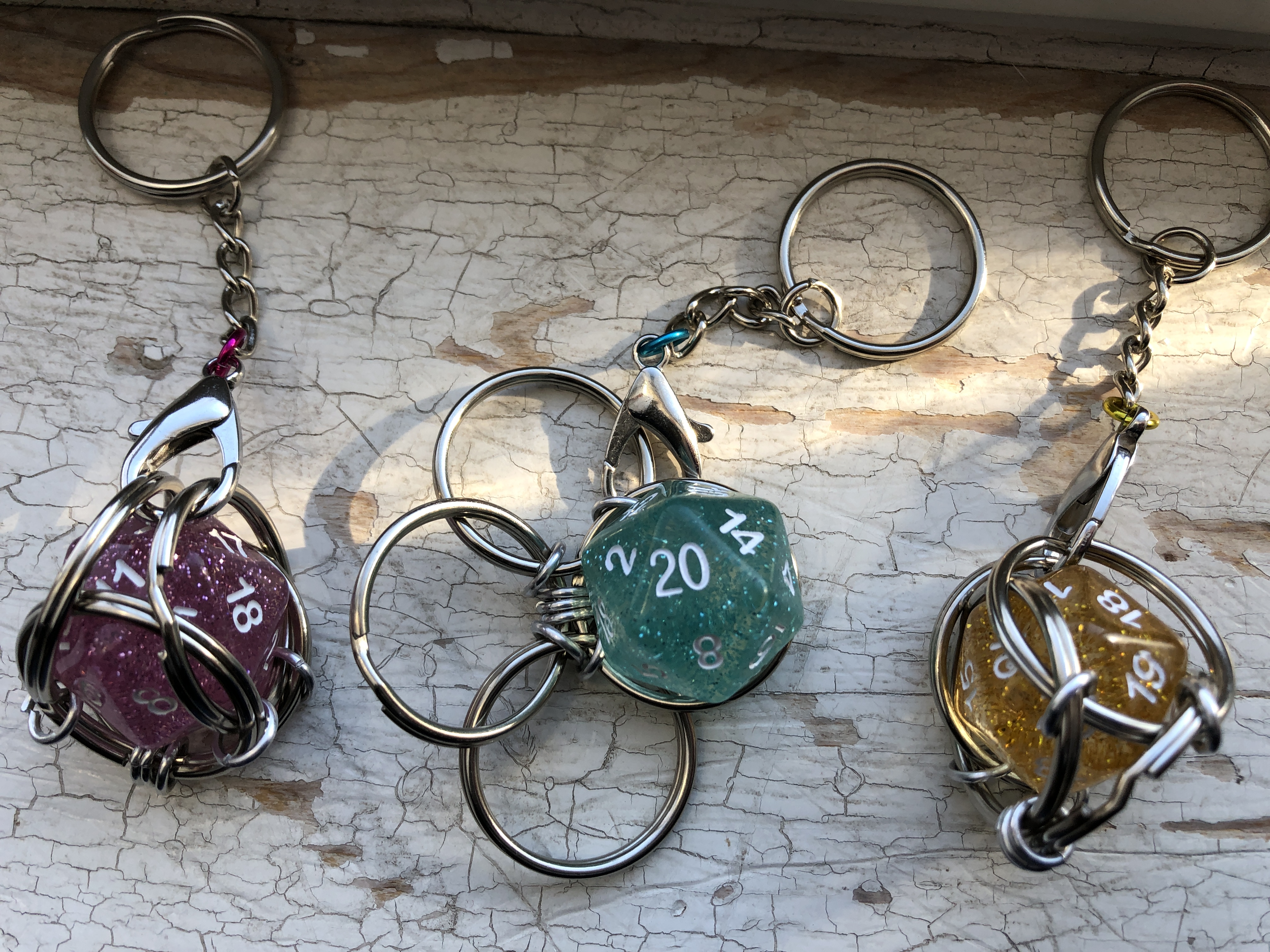 Playable Caged d20 Keychains--sparkly!