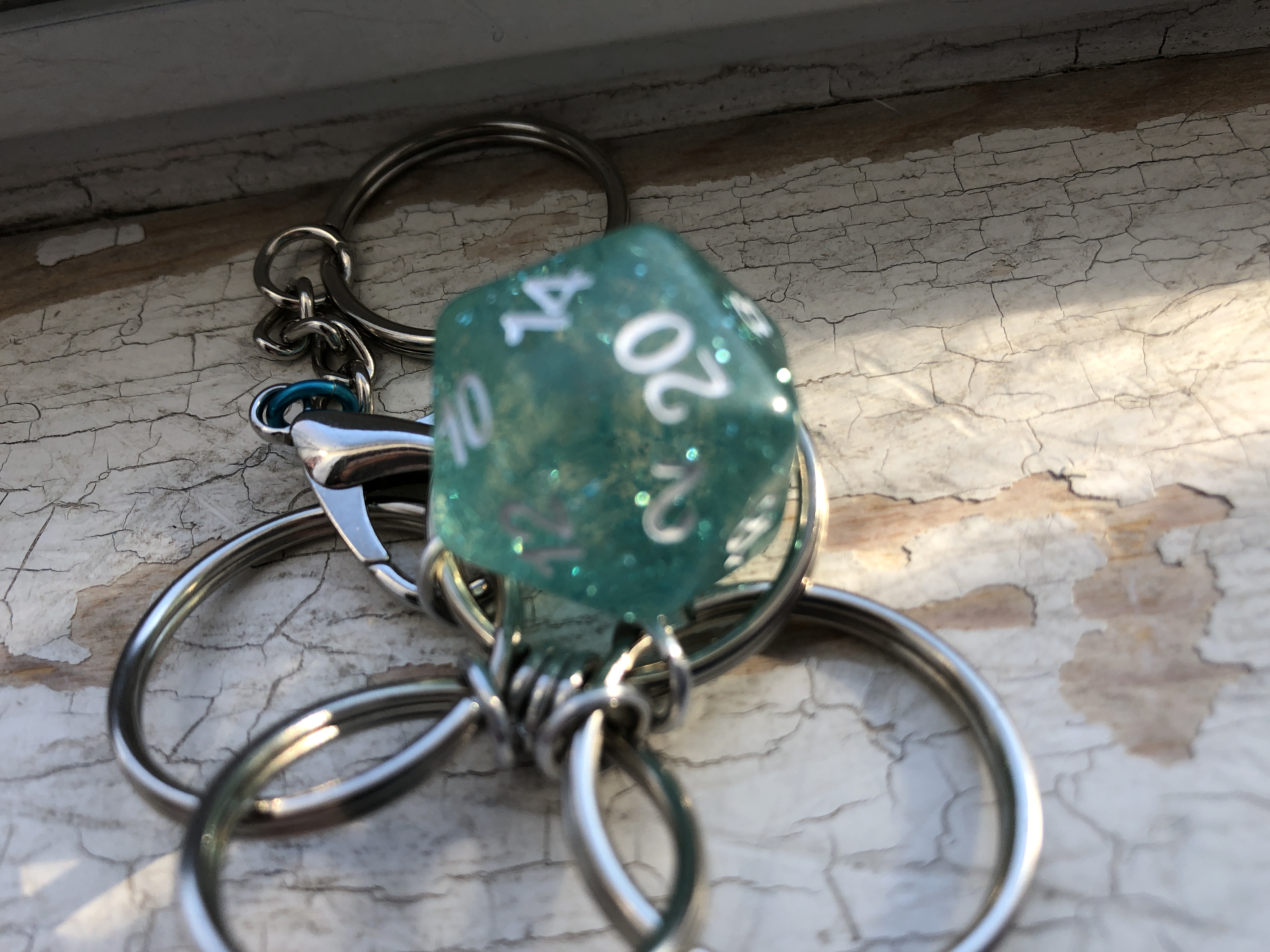 Playable Caged d20 Keychains--sparkly!