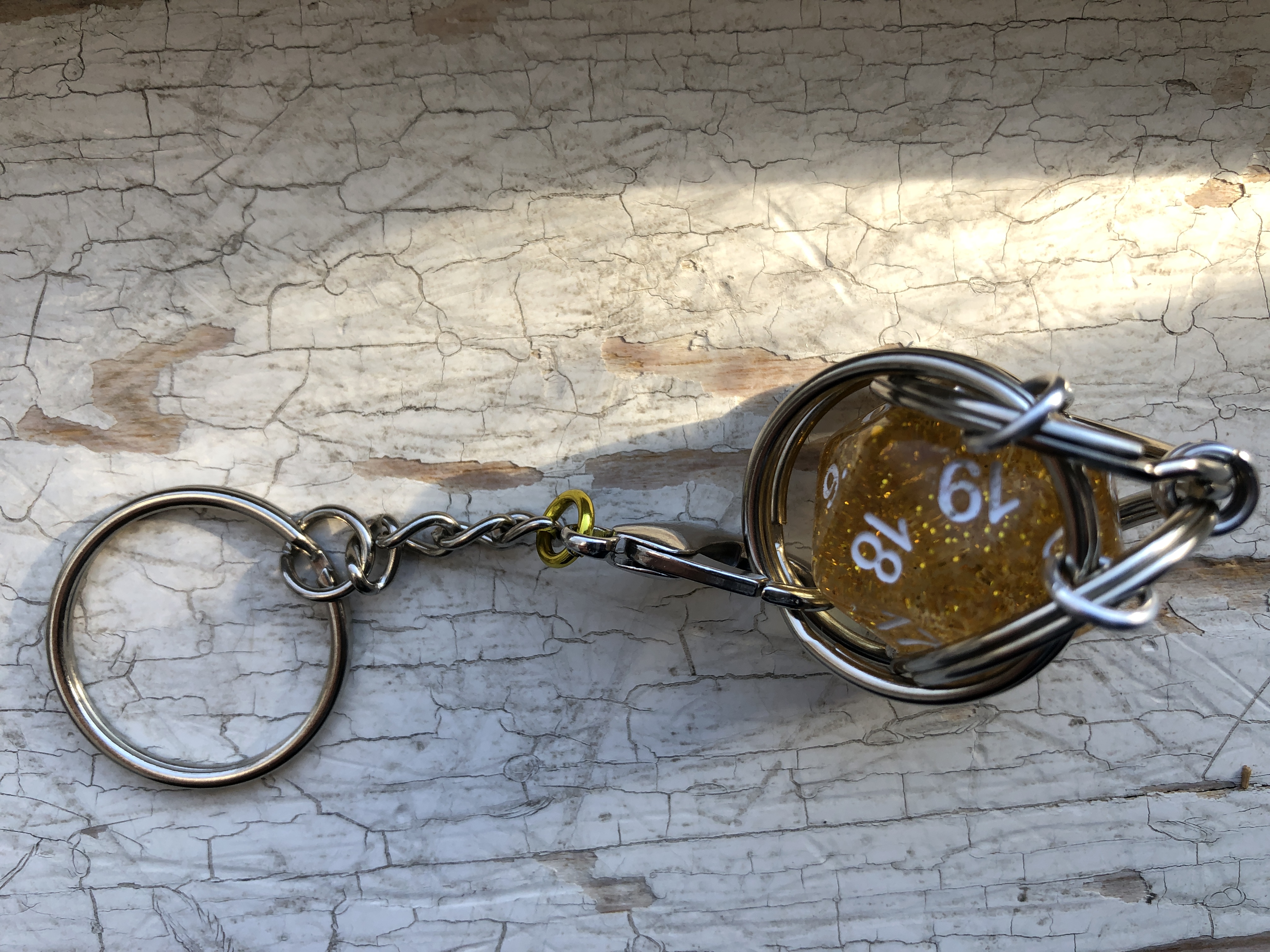 Playable Caged d20 Keychains--sparkly!