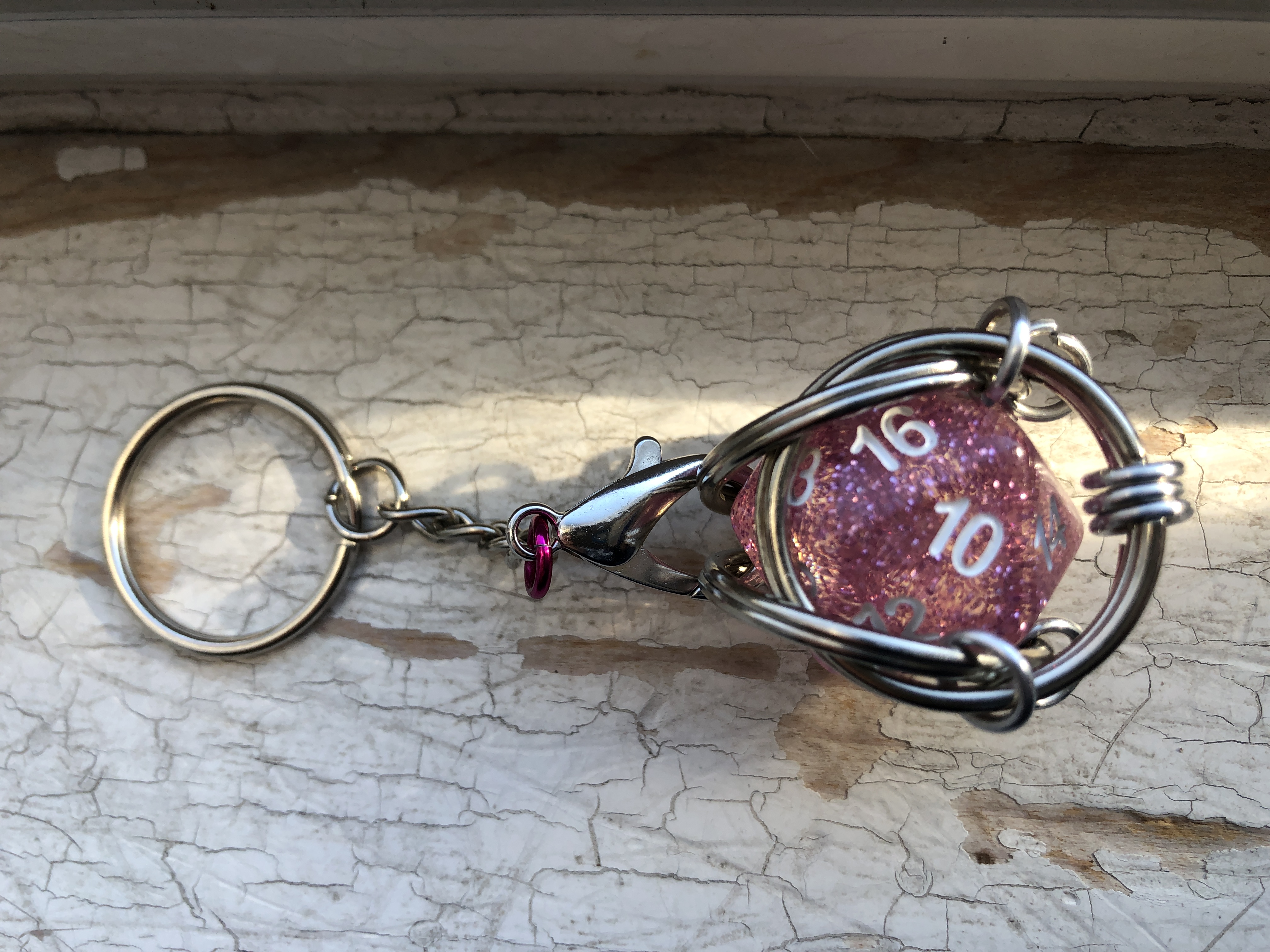 Playable Caged d20 Keychains--sparkly!