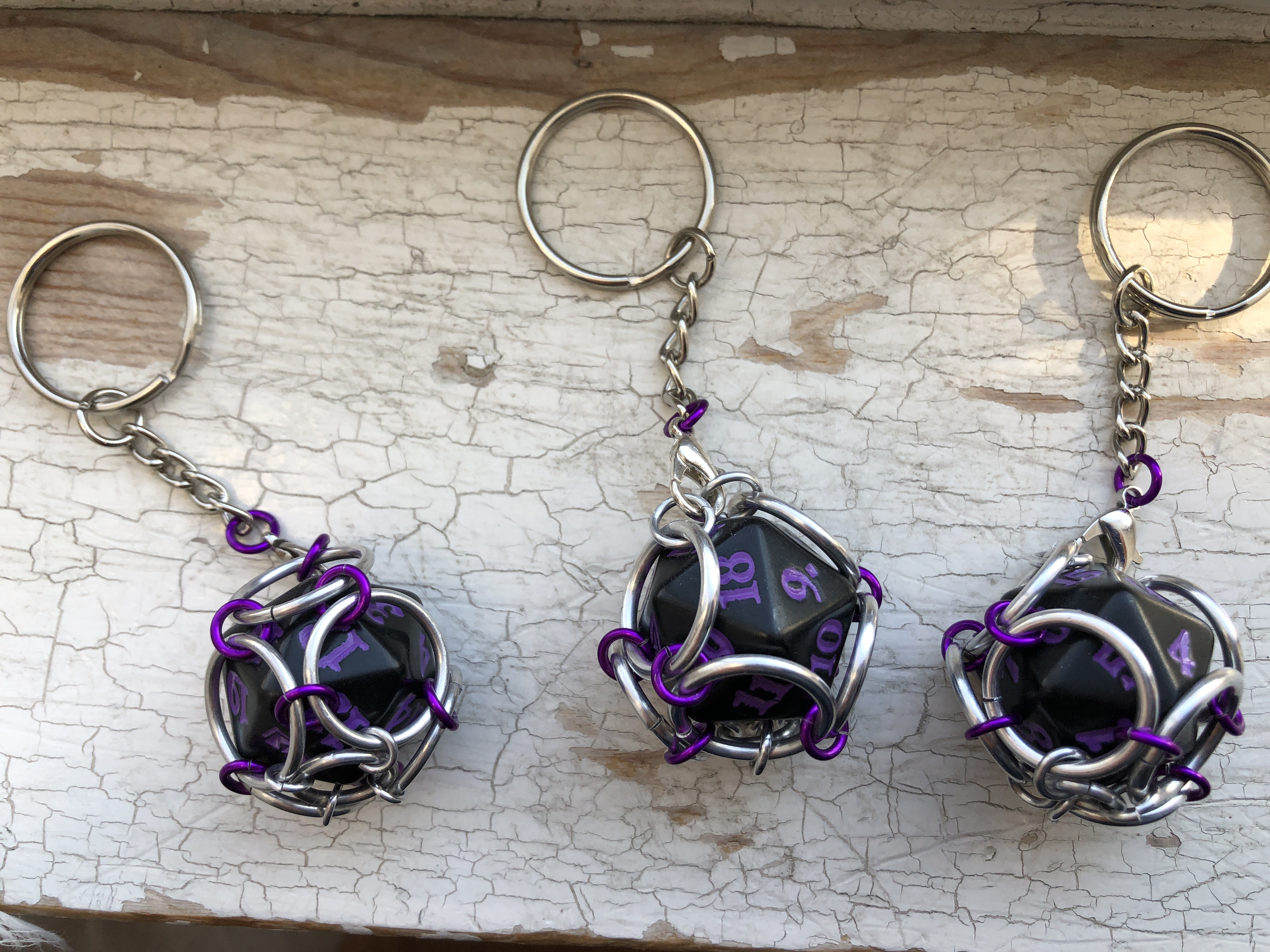 Playable Caged Spindown d20 Keychains--Purple