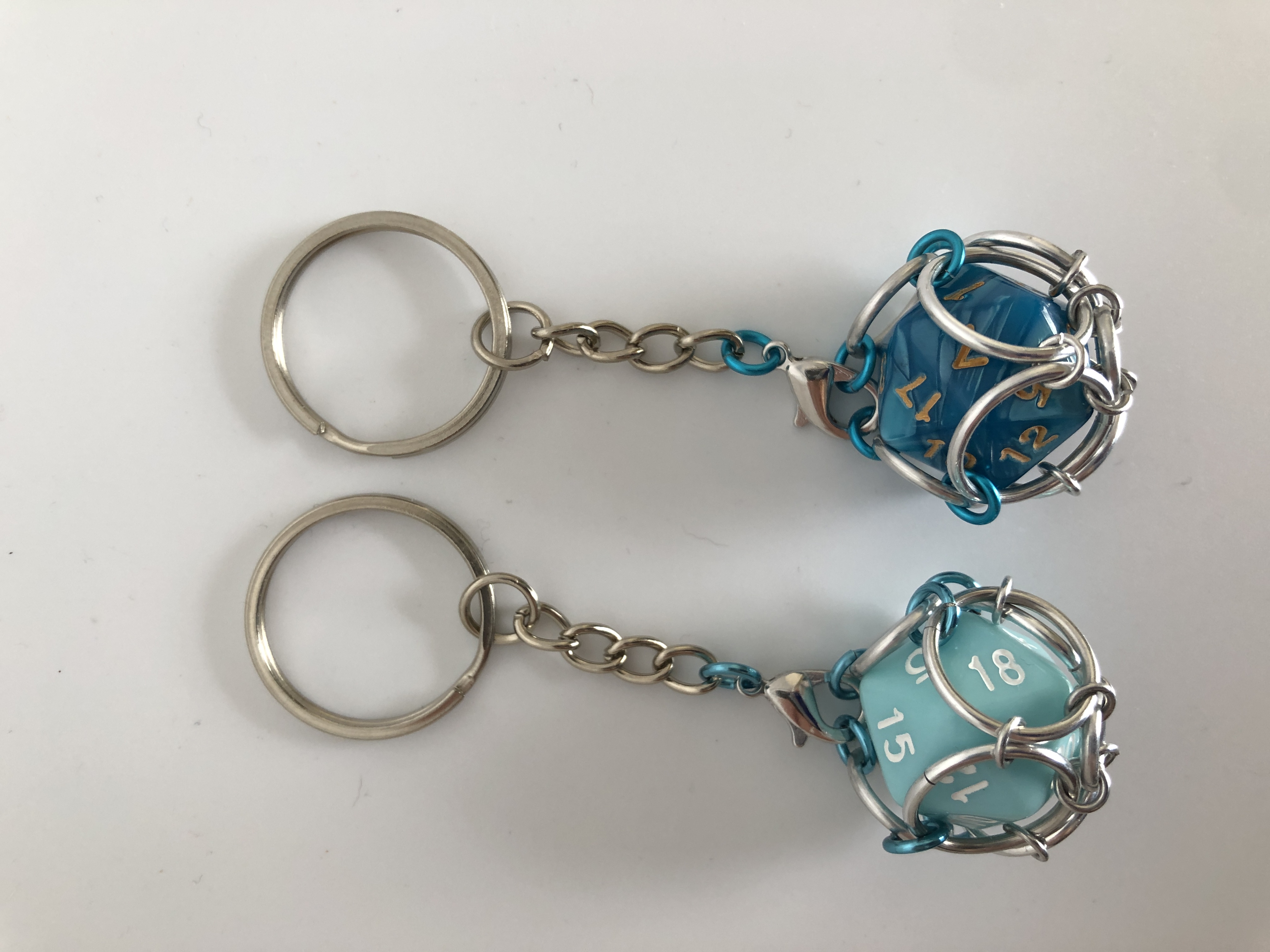 Playable Caged d20 Keychains--Teal