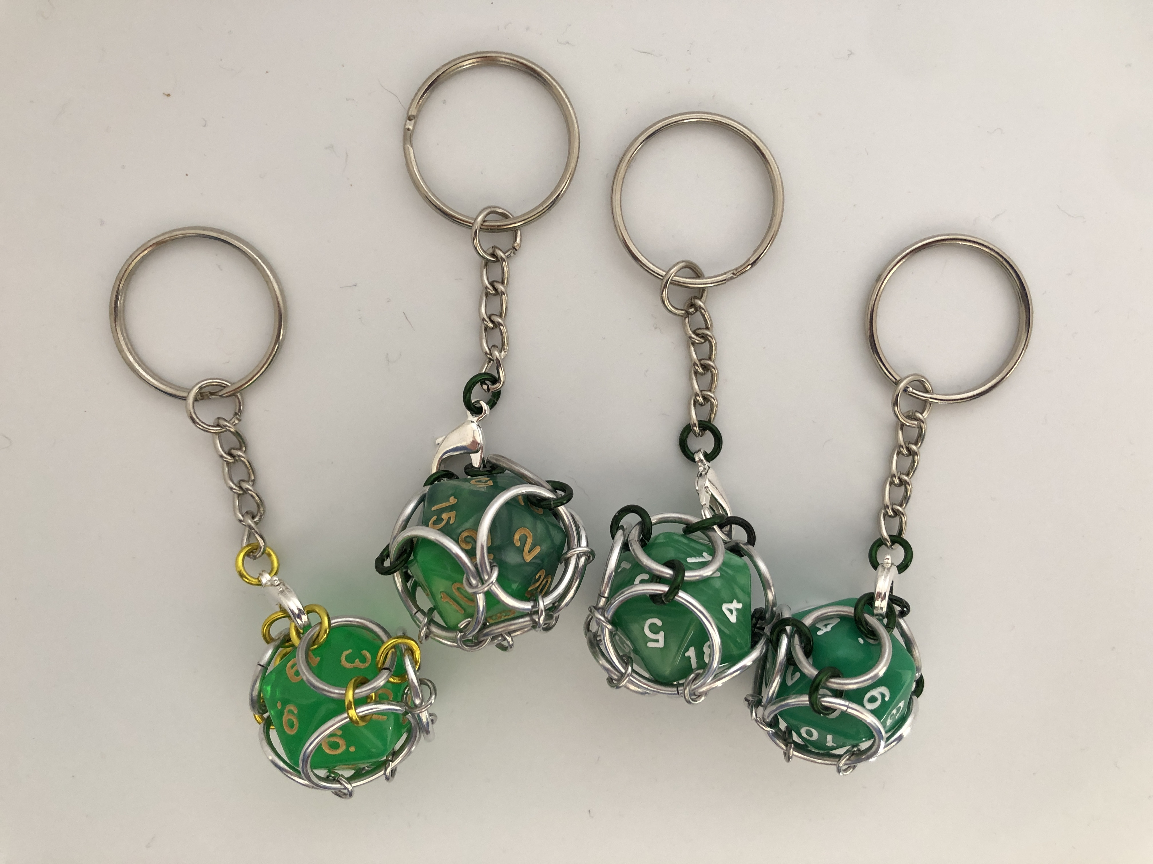 Playable Caged d20 Keychains--Vivid Greens