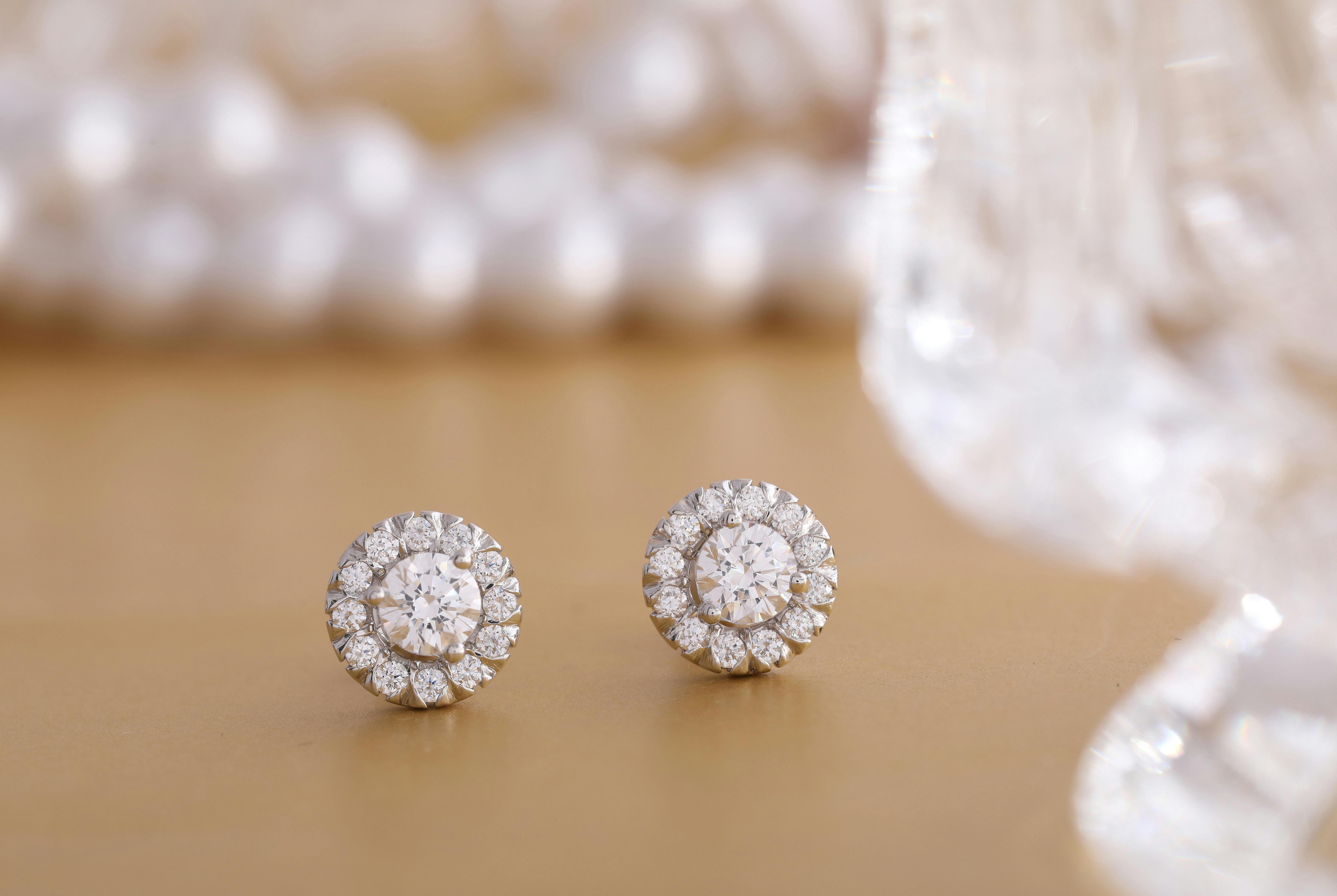 Luxury Solitaire Diamond Earrings with Shimmering Round Diamond Surround