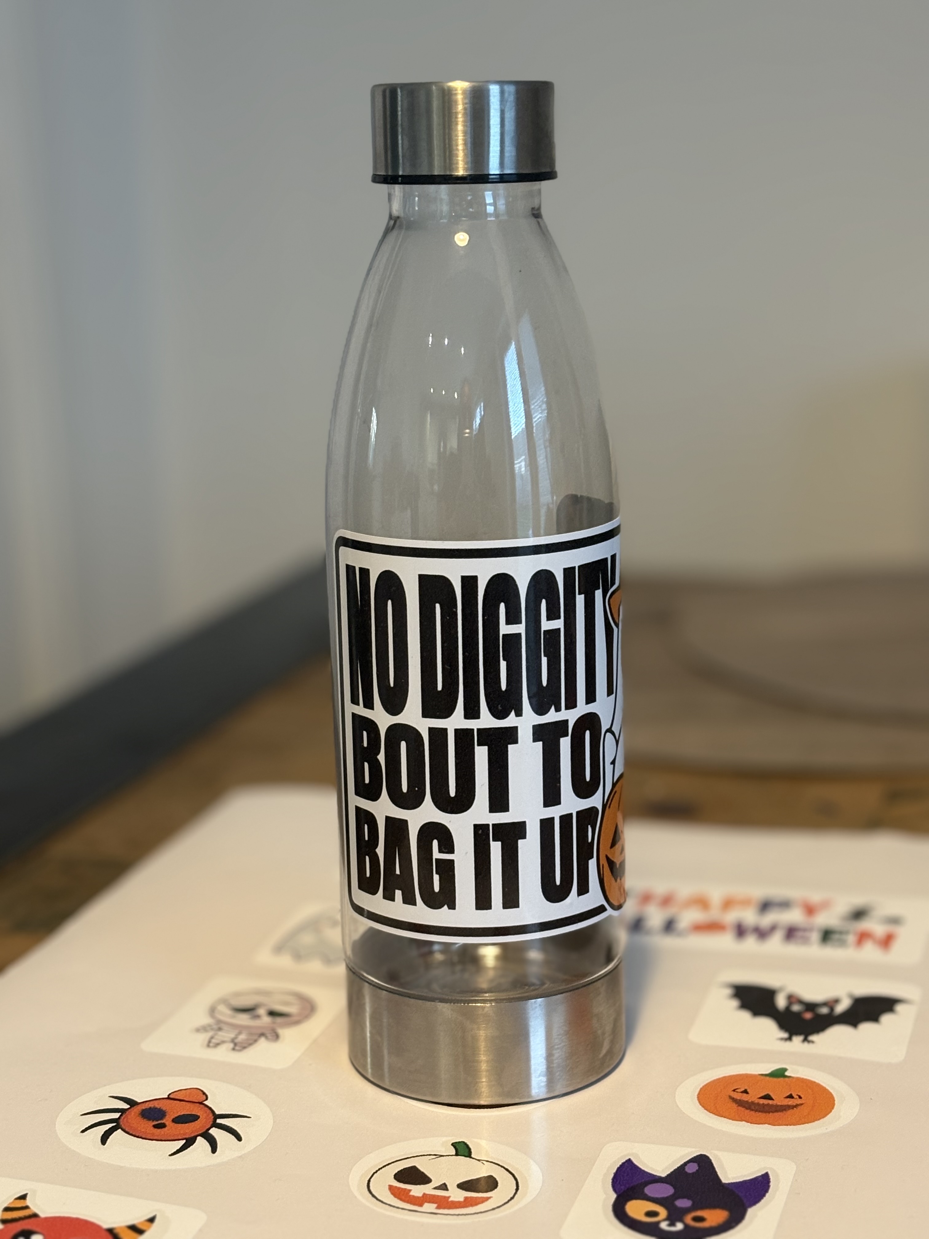 Halloween Themed Water Bottle - 'No diggity bout to bag it up' Clear water bottle with fun text and ghost print. All orders include a fun sticker sheet