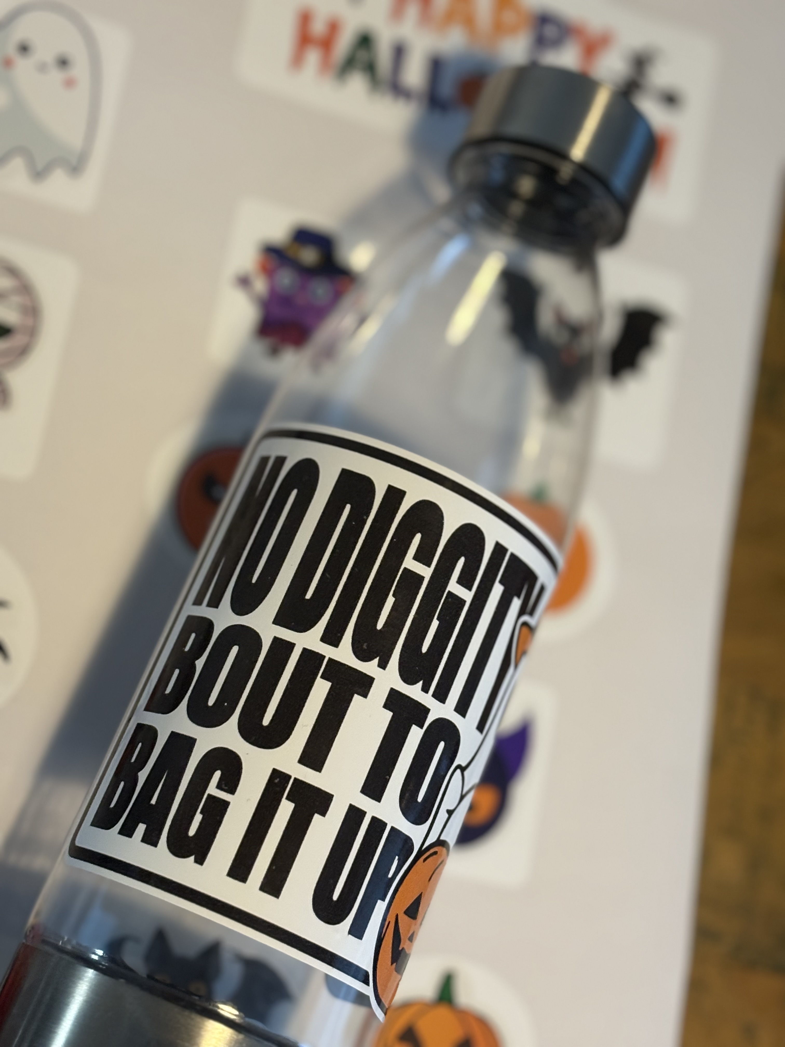 Halloween Themed Water Bottle - 'No diggity bout to bag it up' Clear water bottle with fun text and ghost print. All orders include a fun sticker sheet