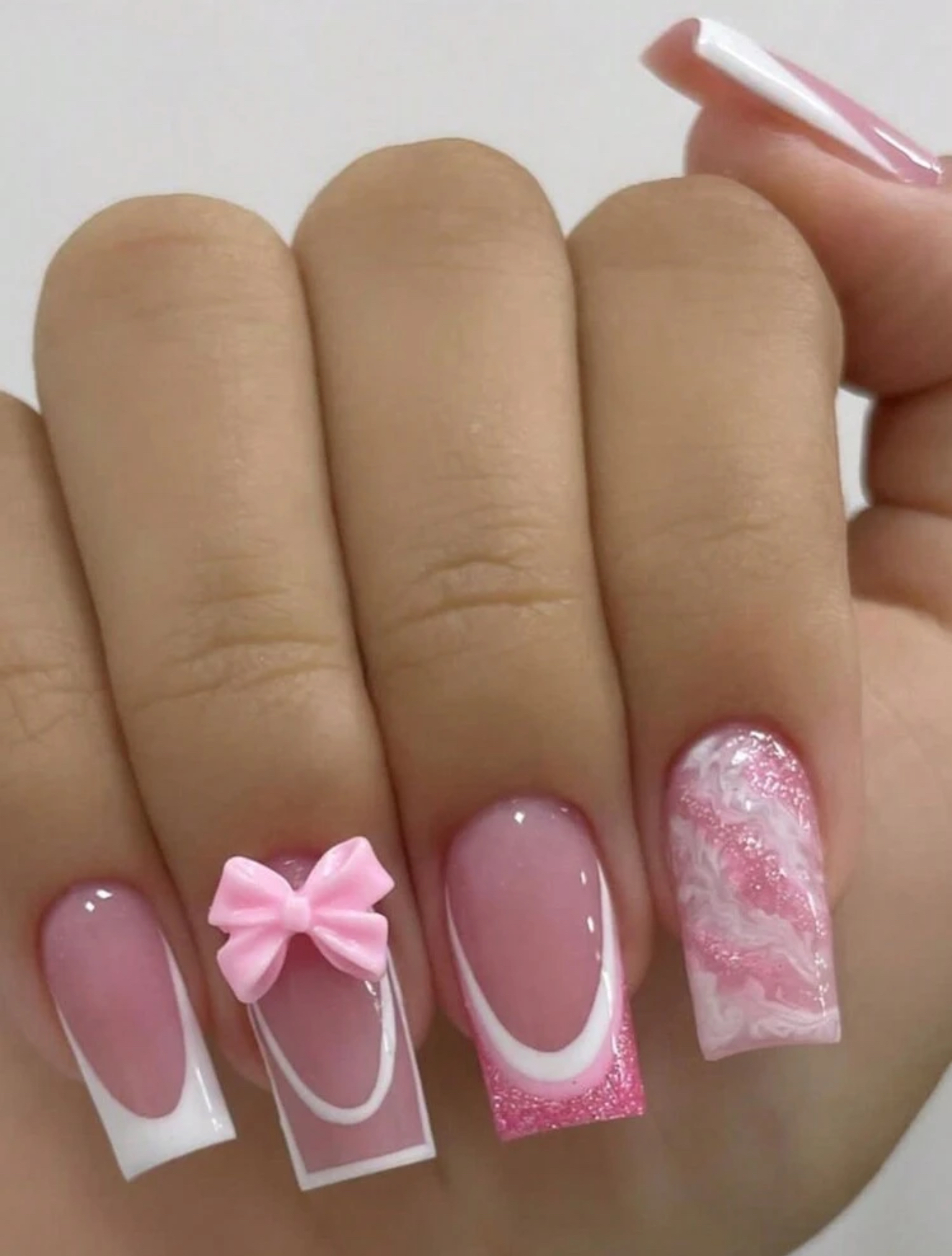 Pink and White Decorative Nails