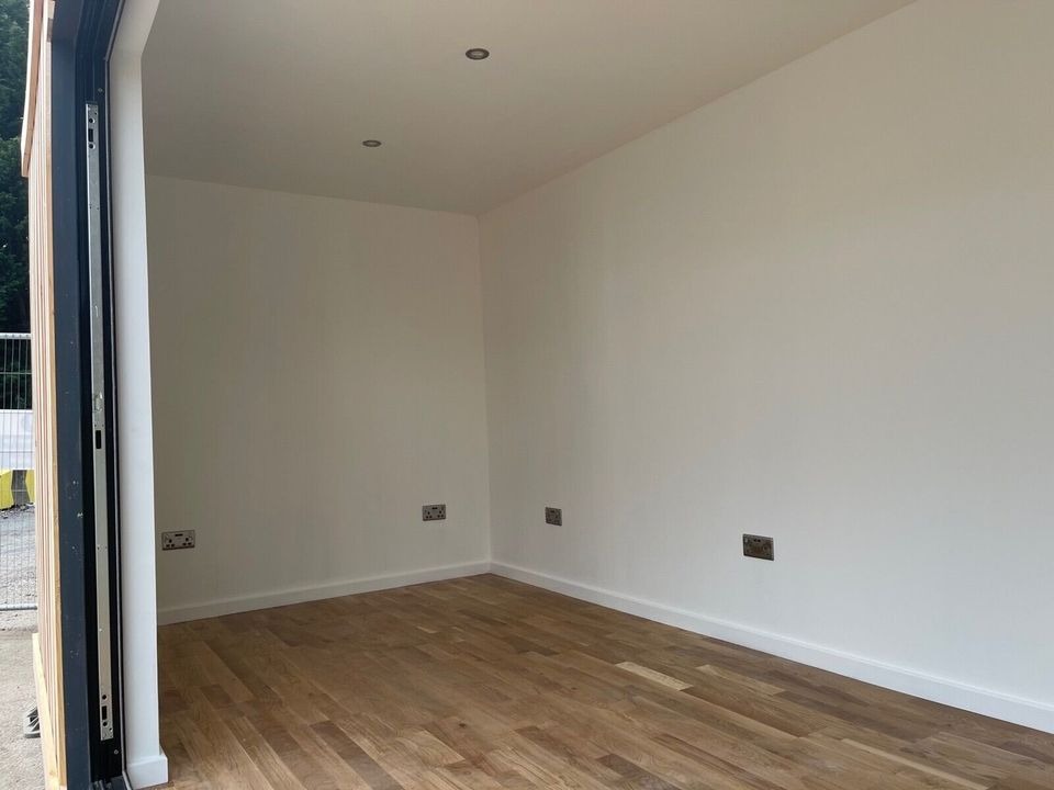 20x8 Cladded Garden Room With folding glass door