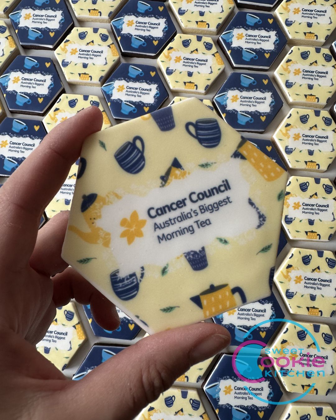 Hexagon Biggest Morning Tea Cookies: Cancer Council logo