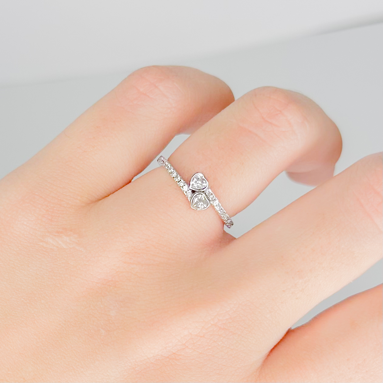 Anillo corazones entrelazados