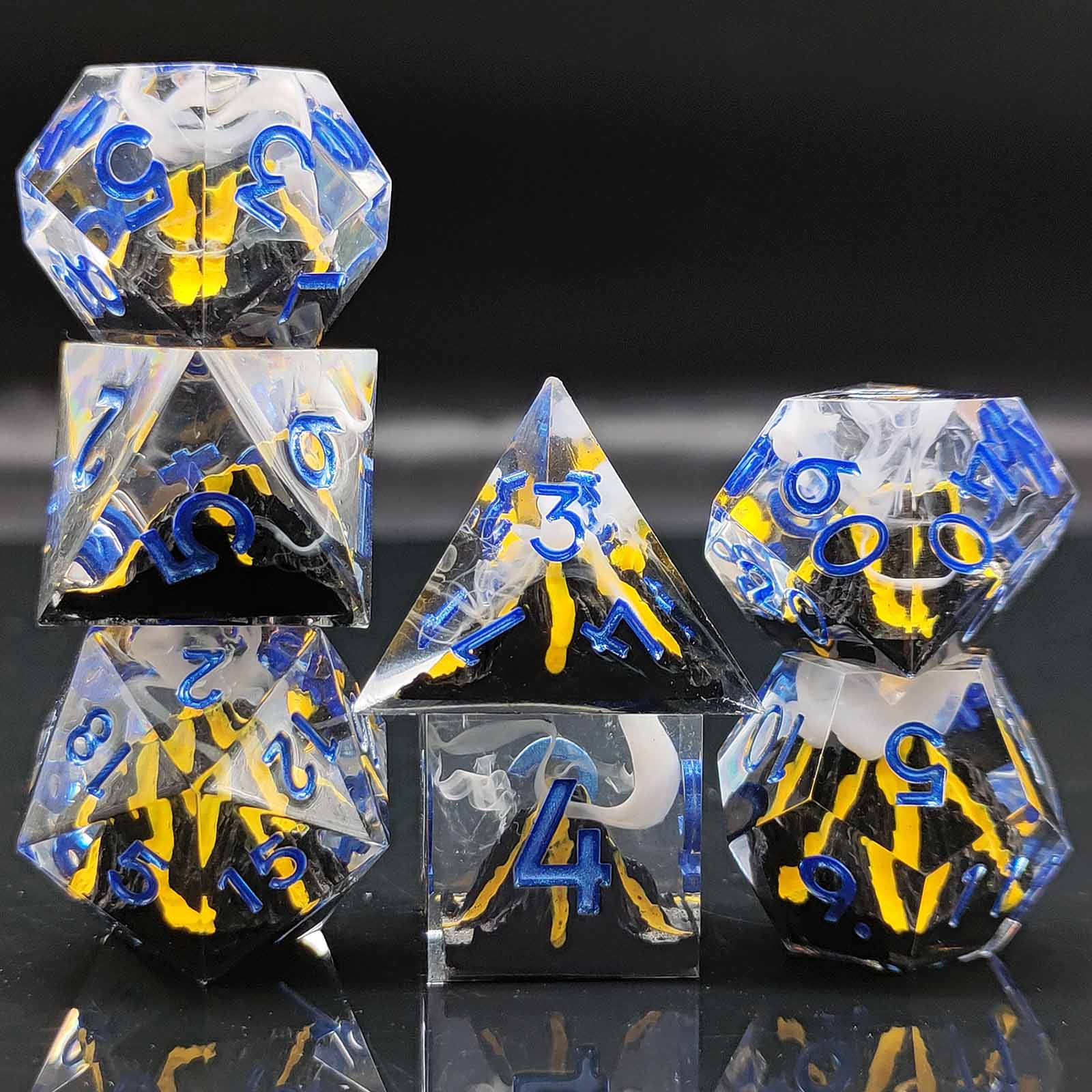 Resin dice with volcano landscape embedded