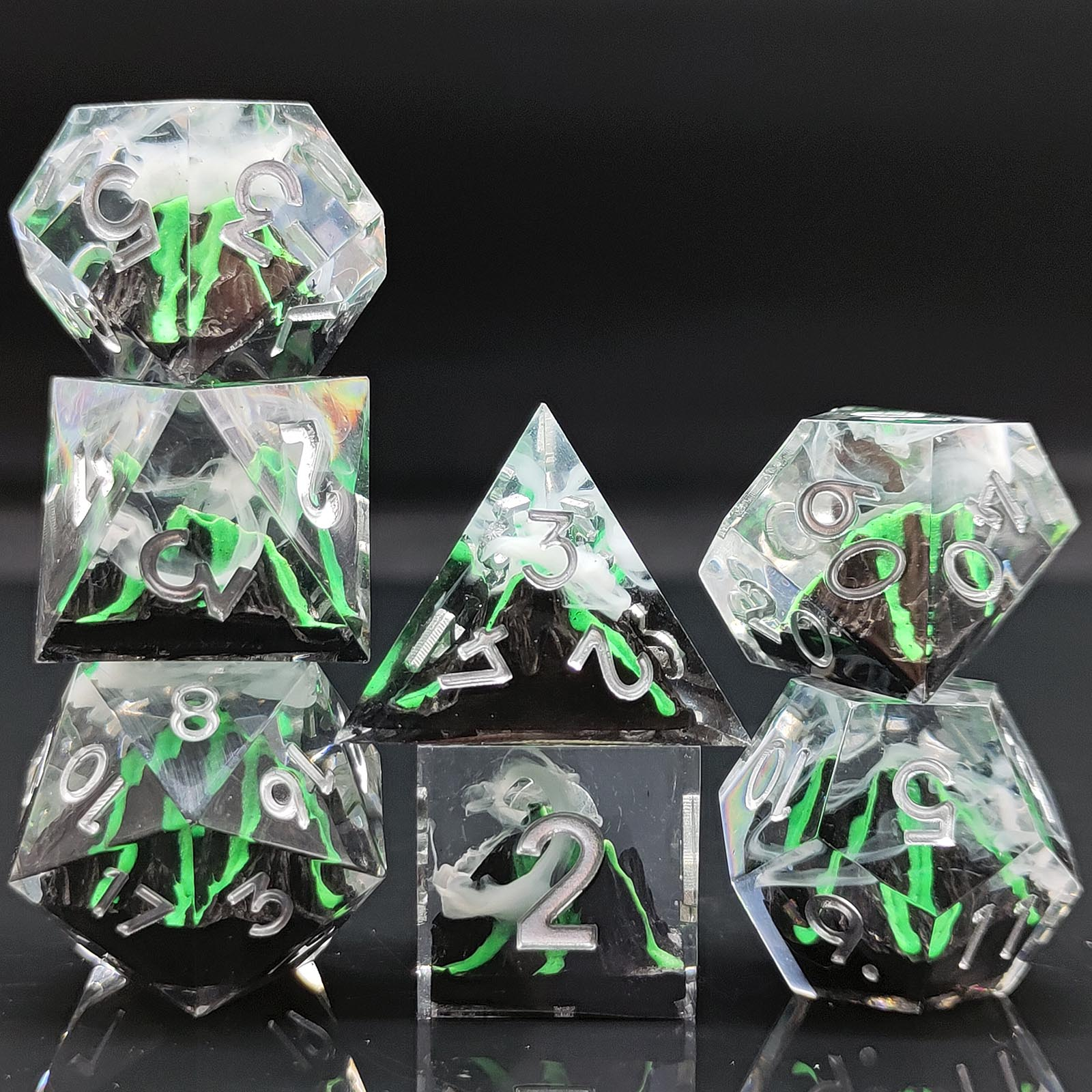 Resin dice with volcano landscape embedded