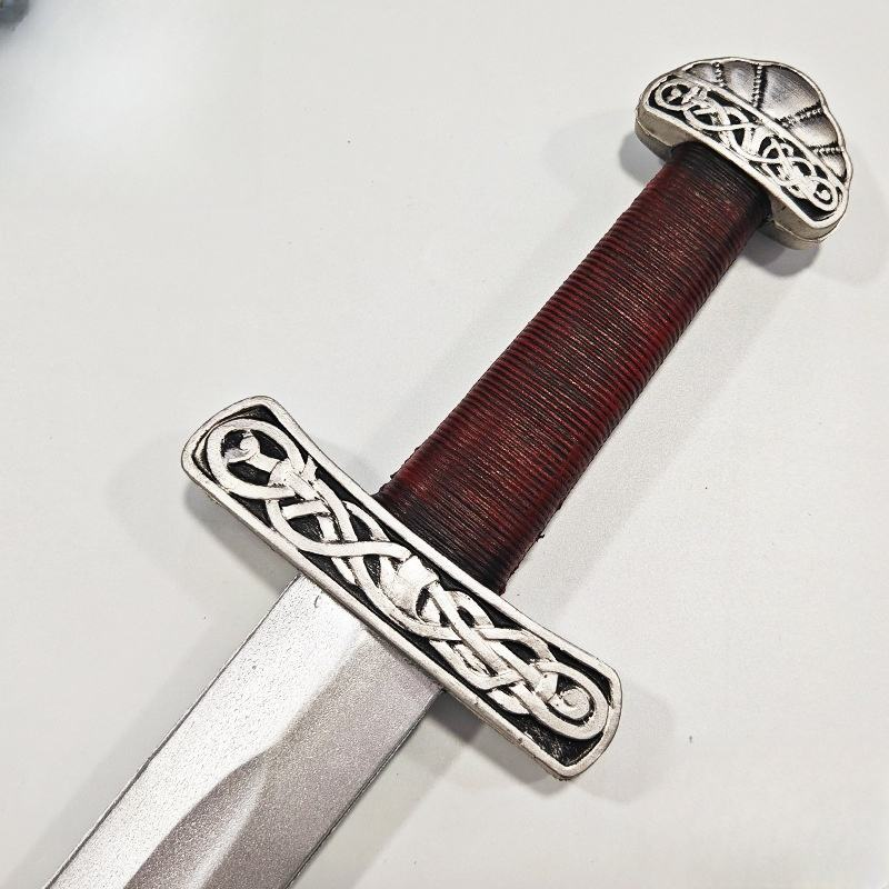 Curved handle wolf sword