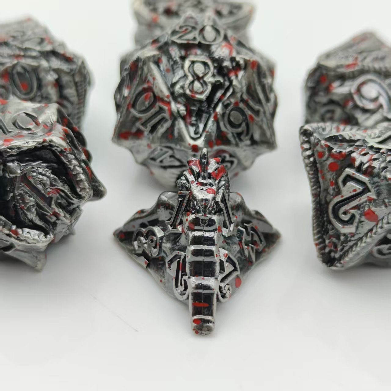 Embossed dragon and metal set dice