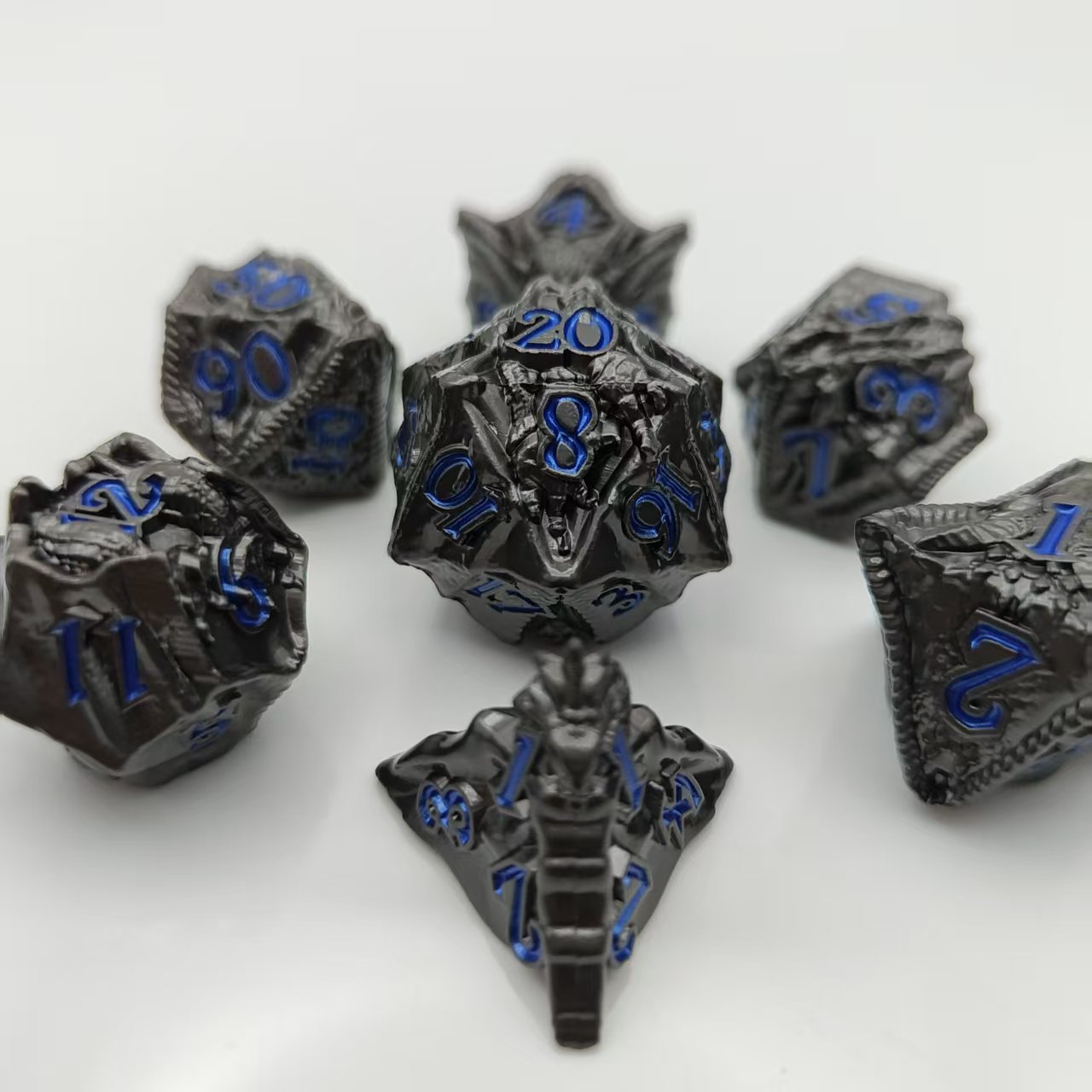 Embossed dragon and metal set dice