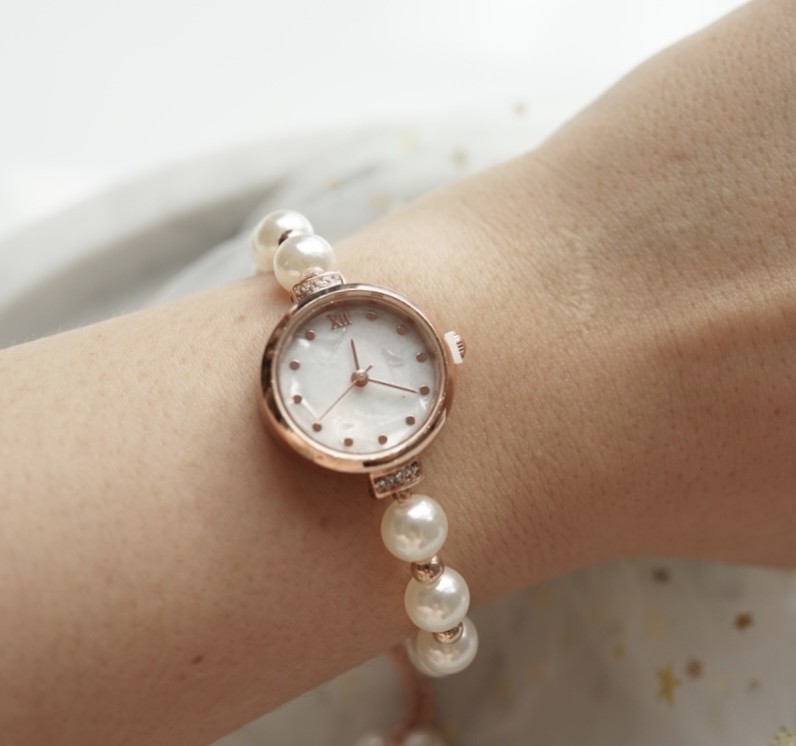 "Celestial Timekeepers Pearl" : Cosmic Energy-infused Pearl Vintage Bracelet Watch