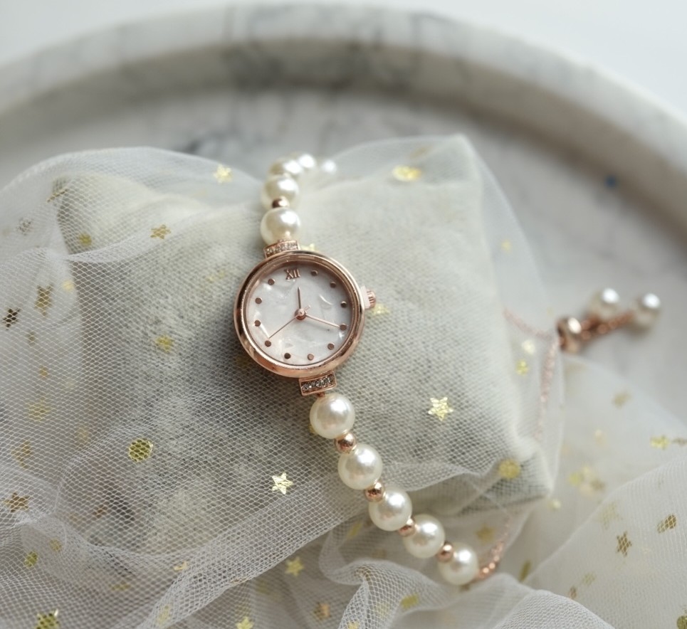 "Celestial Timekeepers Pearl" : Cosmic Energy-infused Pearl Vintage Bracelet Watch