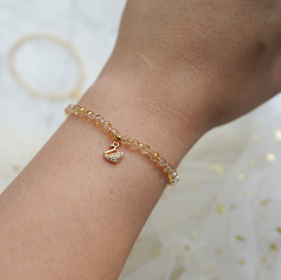“Spellbound Wings of Time" : Swarovski crystal bracelet infused with Wealth + Love Magick Spell