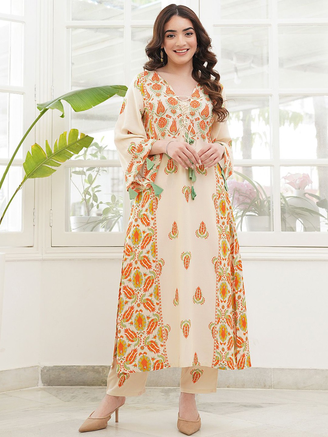 Pure Cotton Paneled Kurta Pant Set with Tie Up Neck Details & Flared Sleeves