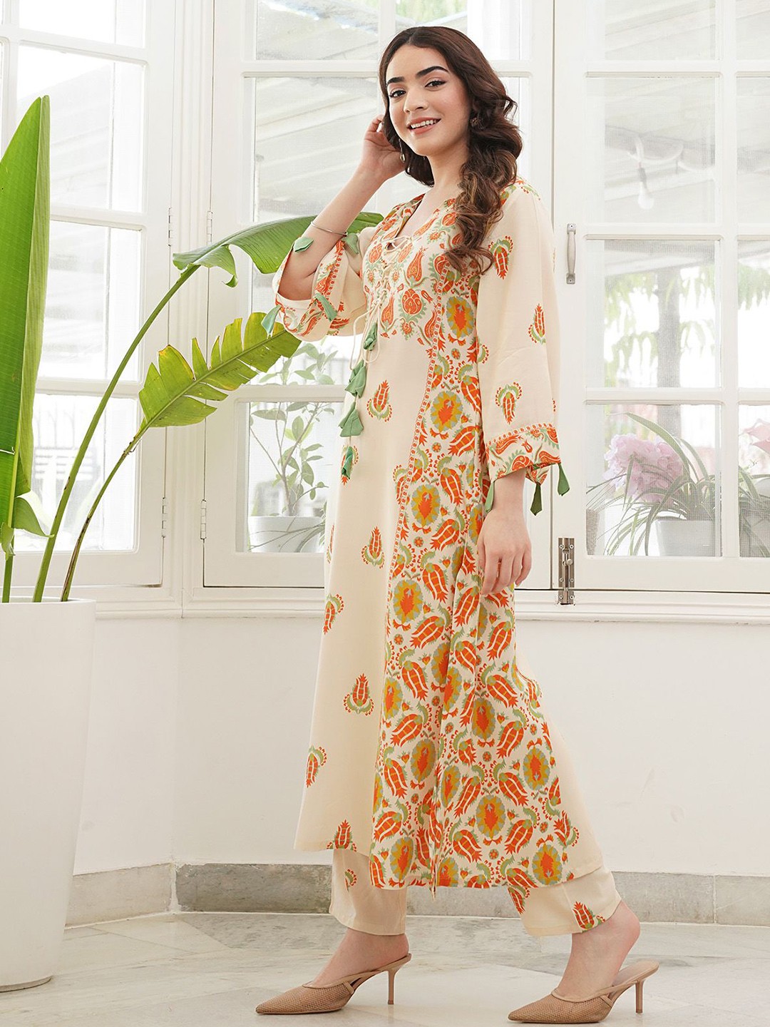Pure Cotton Paneled Kurta Pant Set with Tie Up Neck Details & Flared Sleeves