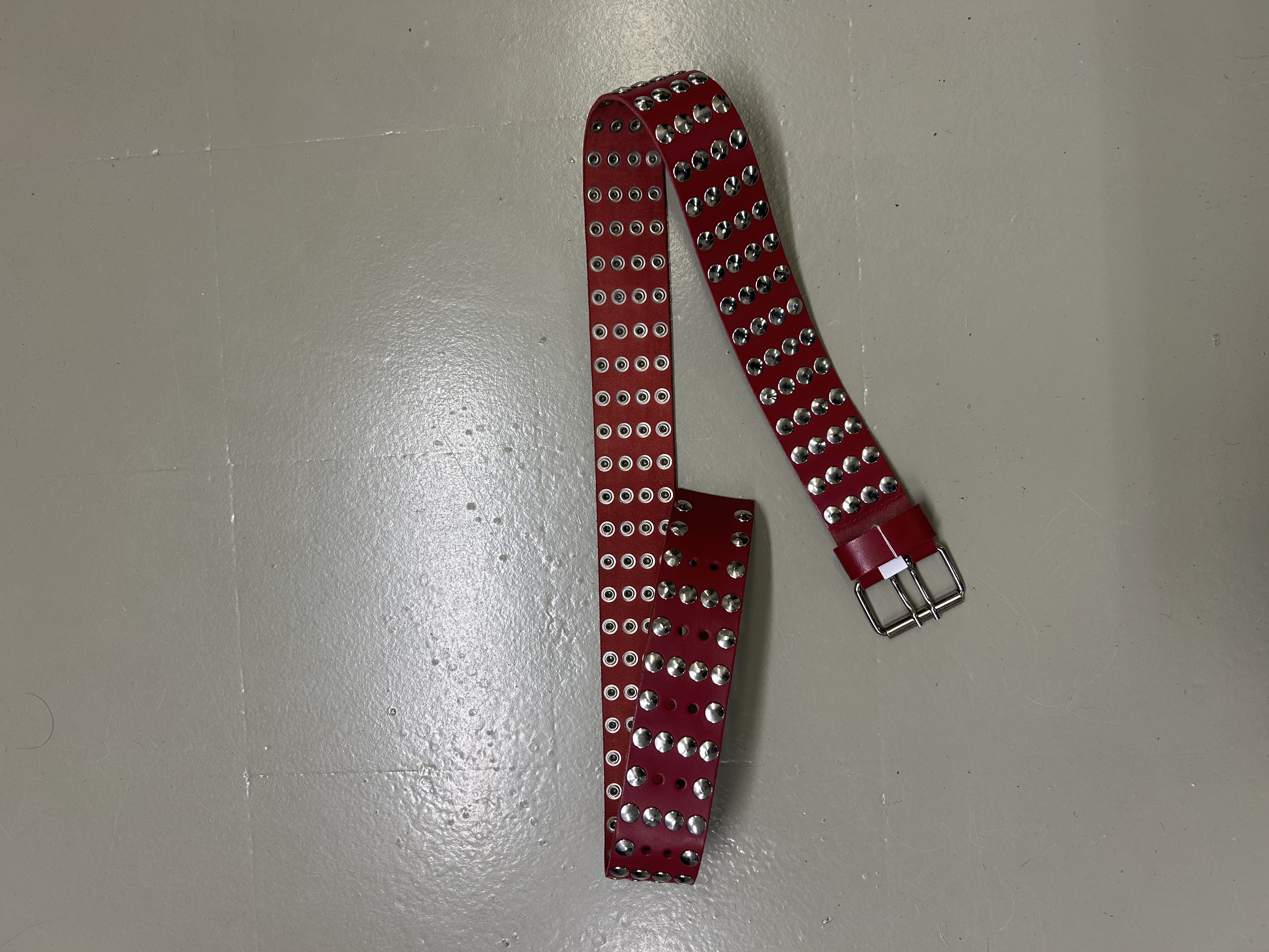Red studded belt