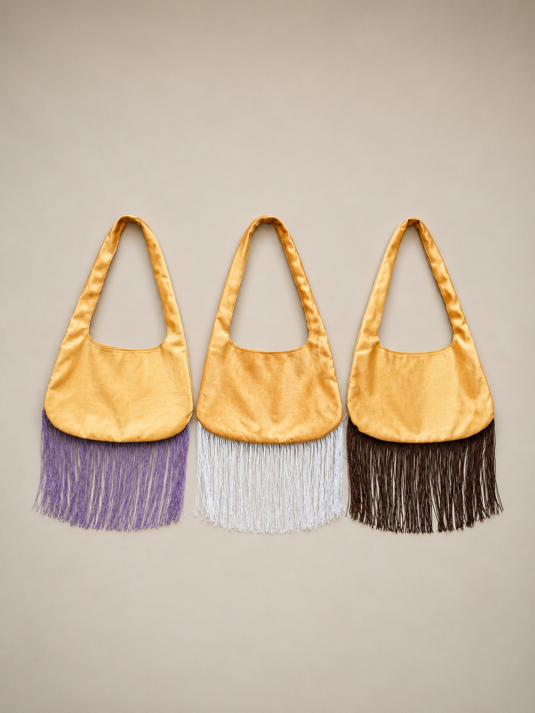 Borsa a spalla in velluto arancione con frange