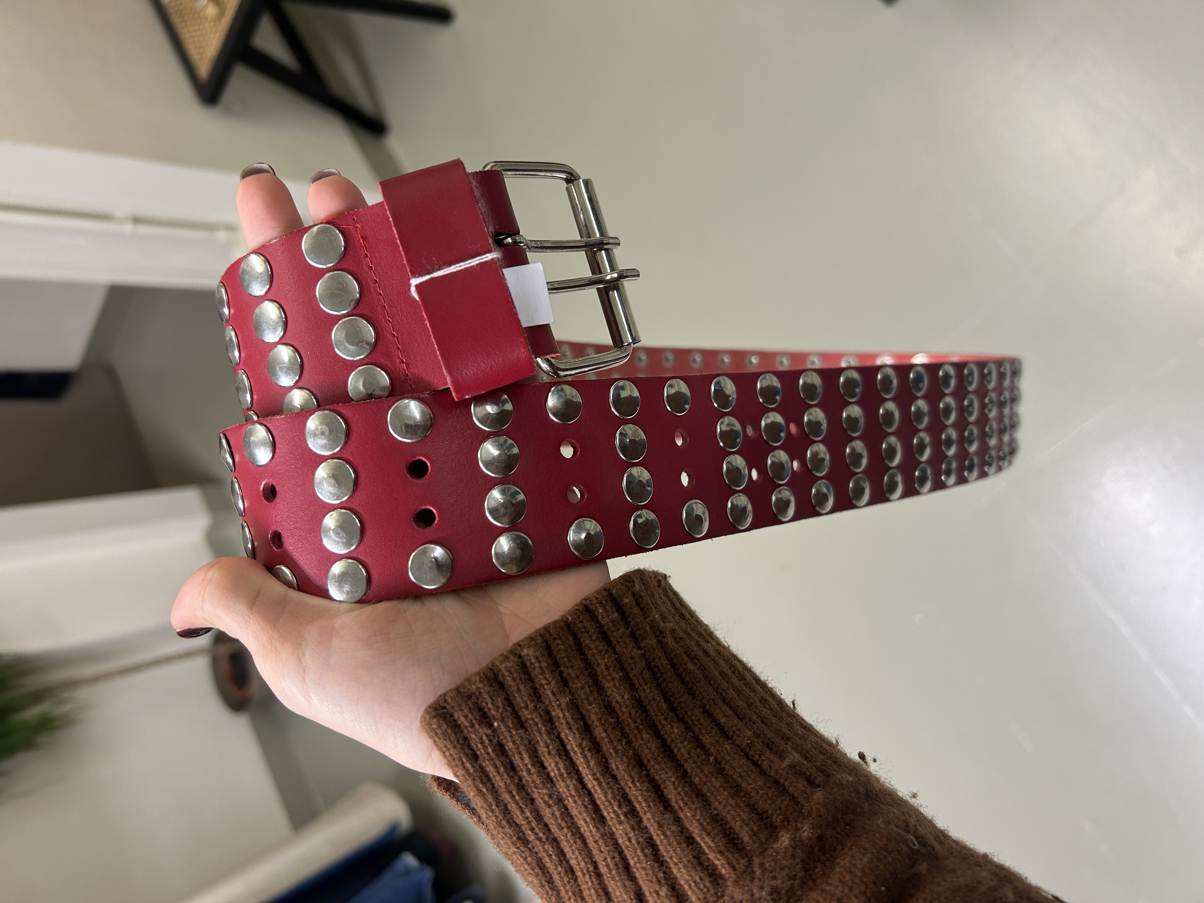 Red studded belt