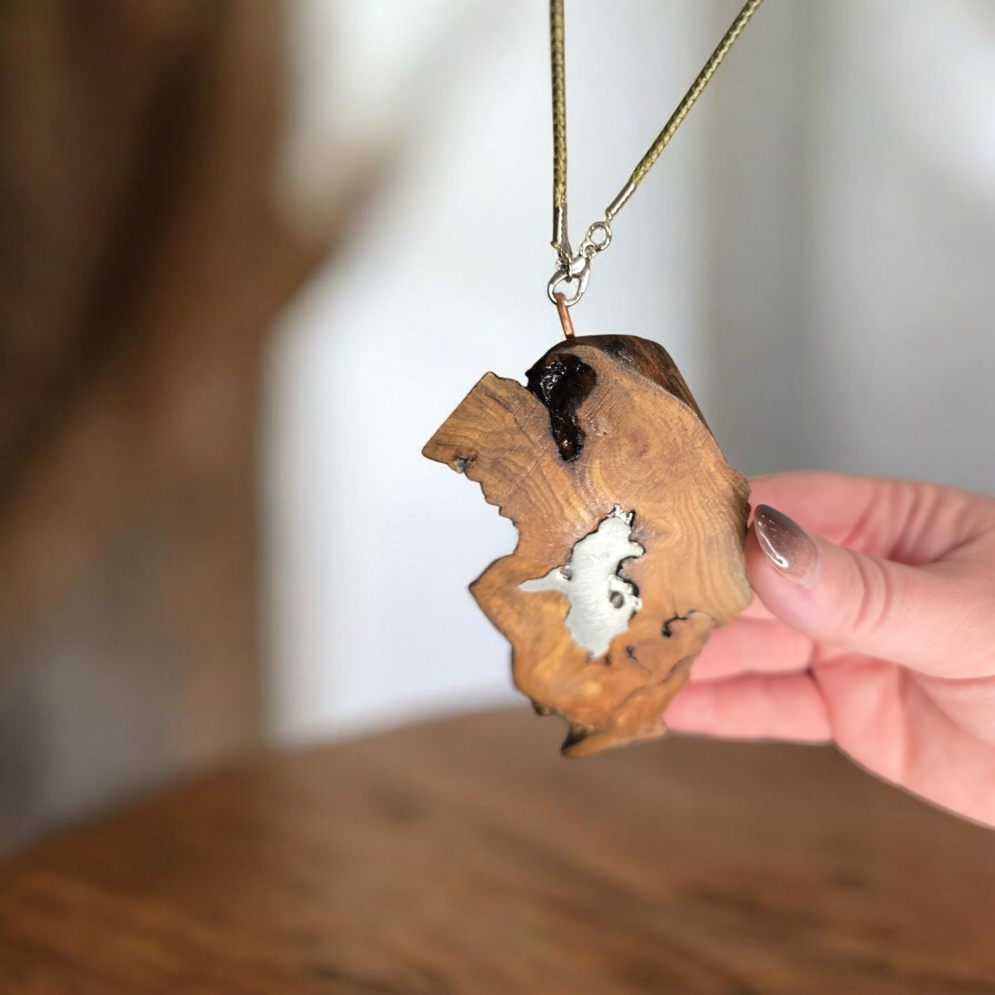 Handcrafted Wooden Pendant with Silver Inlay