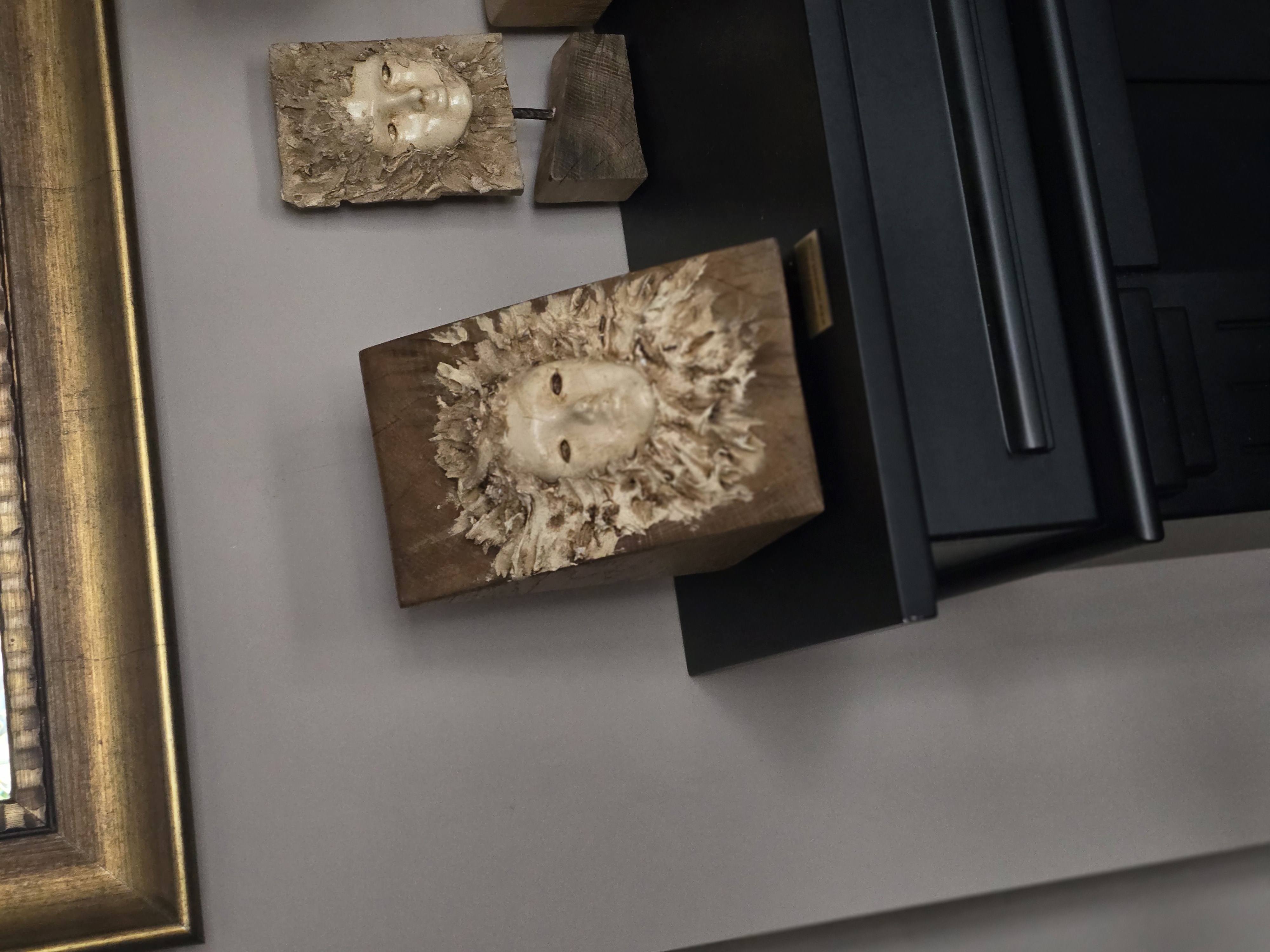 Handcrafted Wooden face on the wood