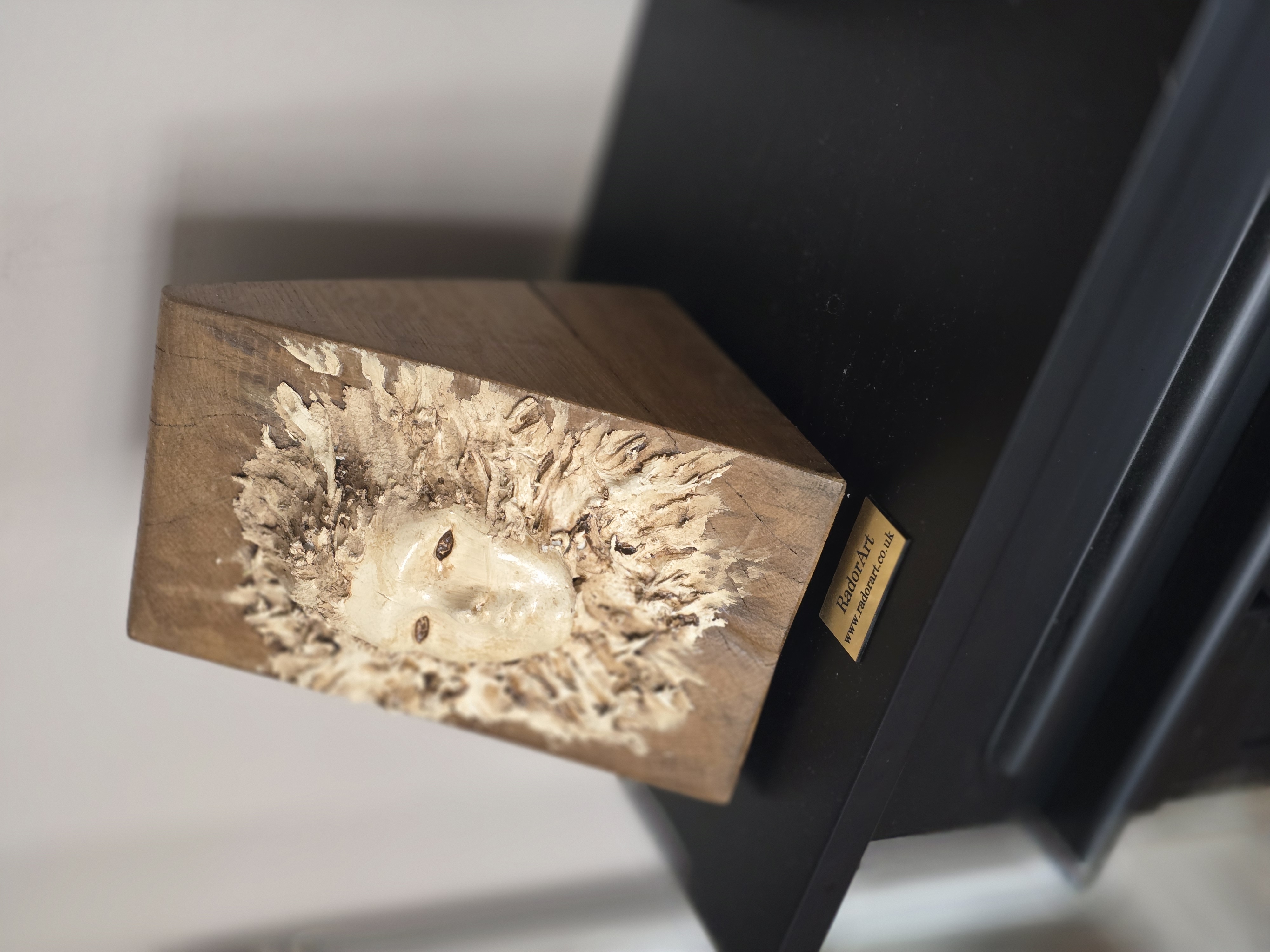 Handcrafted Wooden face on the wood