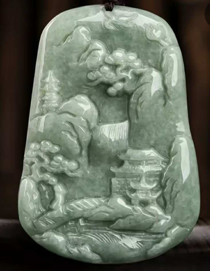 Pendentif en jade sculpté (Arg14)