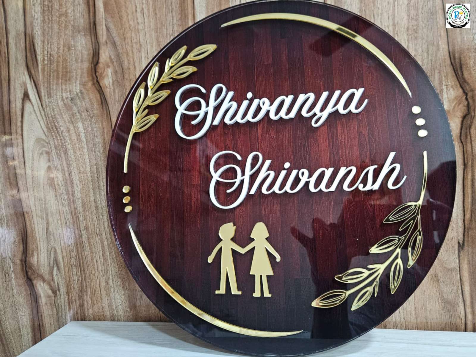 Elegant Circular Acrylic Name Plate with White & Gold Accents