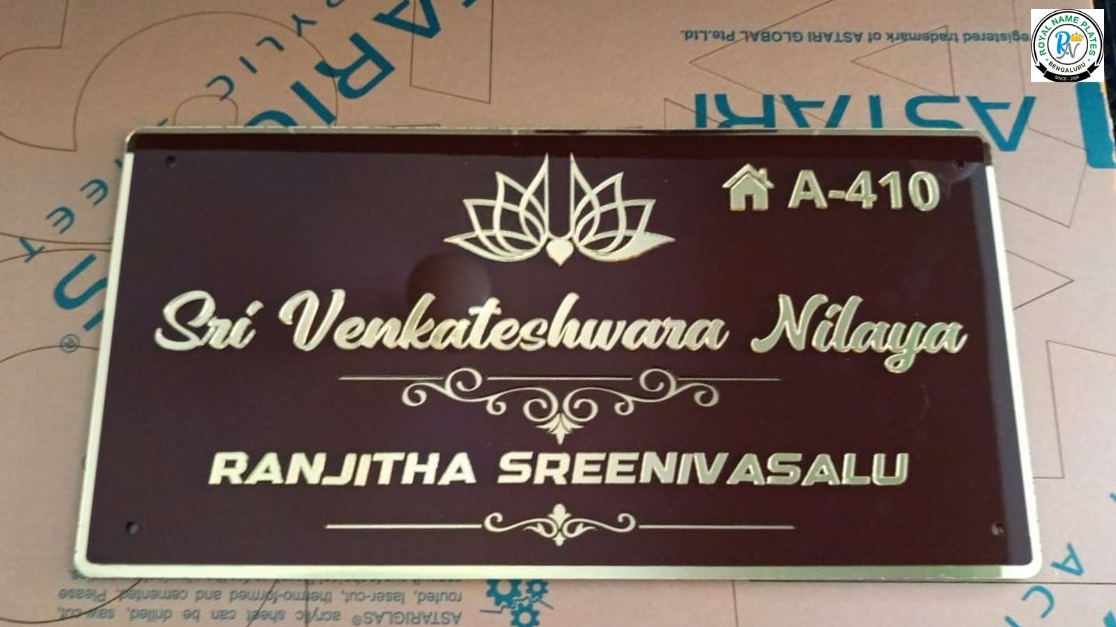 Glossy Acrylic Name Plate with Golden Text & Lotus Design