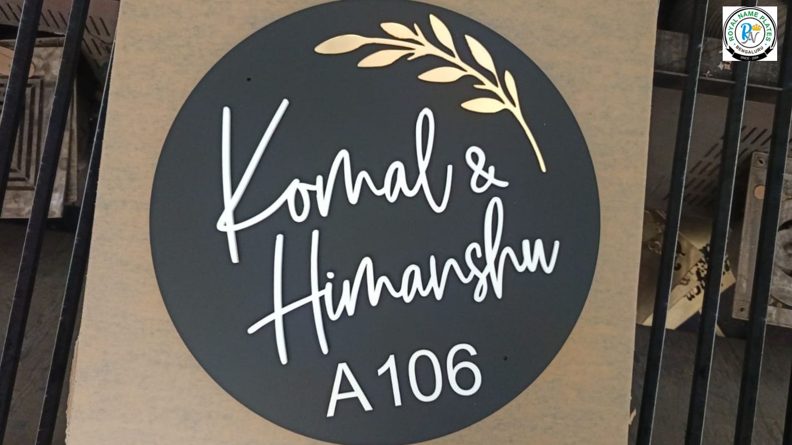 Circular Matte Black Acrylic House Name Plate with Leaf Design