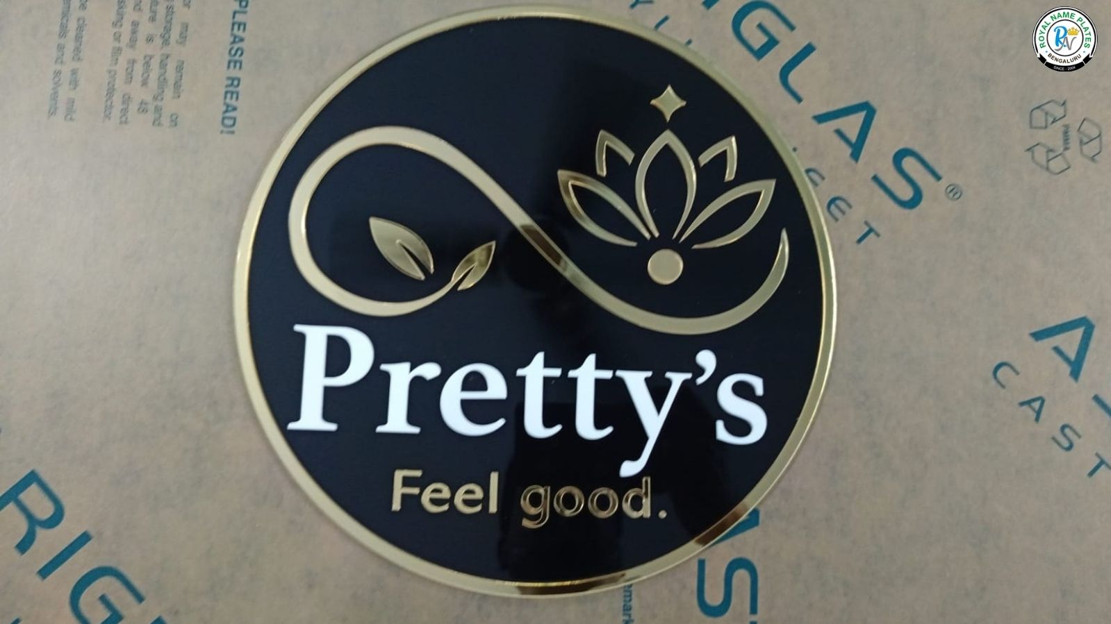 Matte Black Circular Acrylic Name Plate with Golden & White Embossed Text