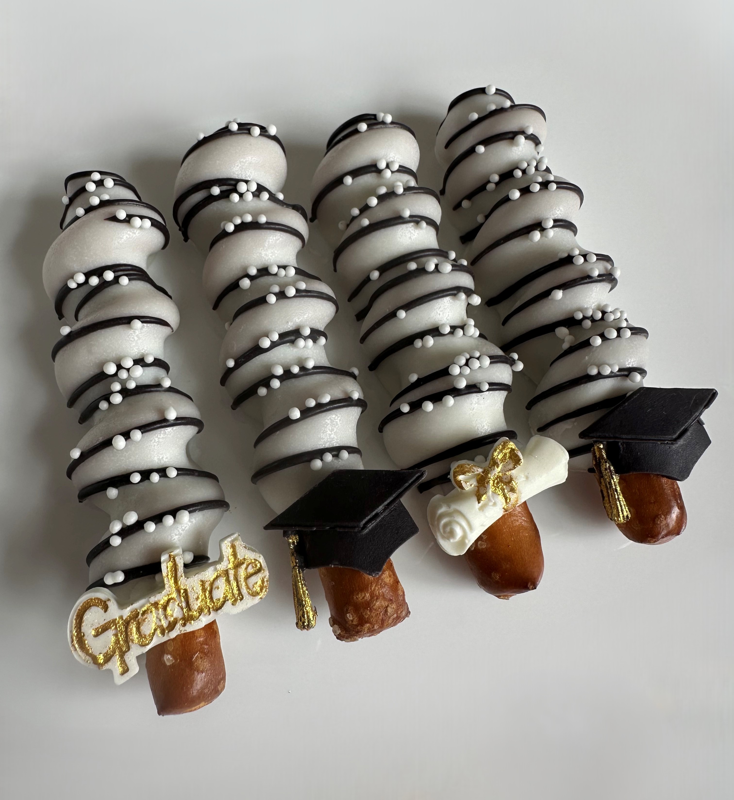 Chocolate Dipped Caramel Wrapped Pretzels - Graduation Theme