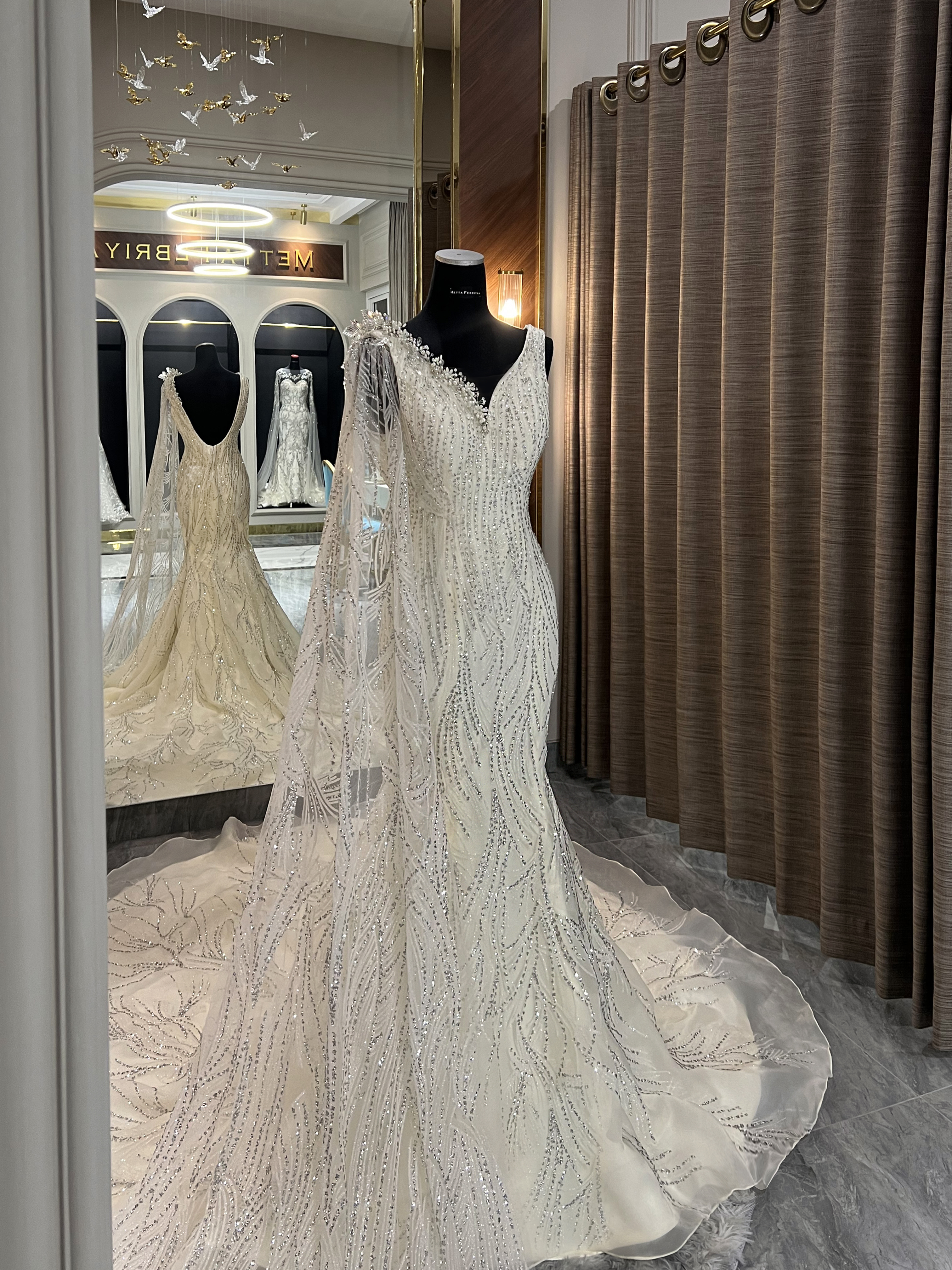 WC008 -  Starlit Grace: The Transforming Mermaid Gown in Ivory White
