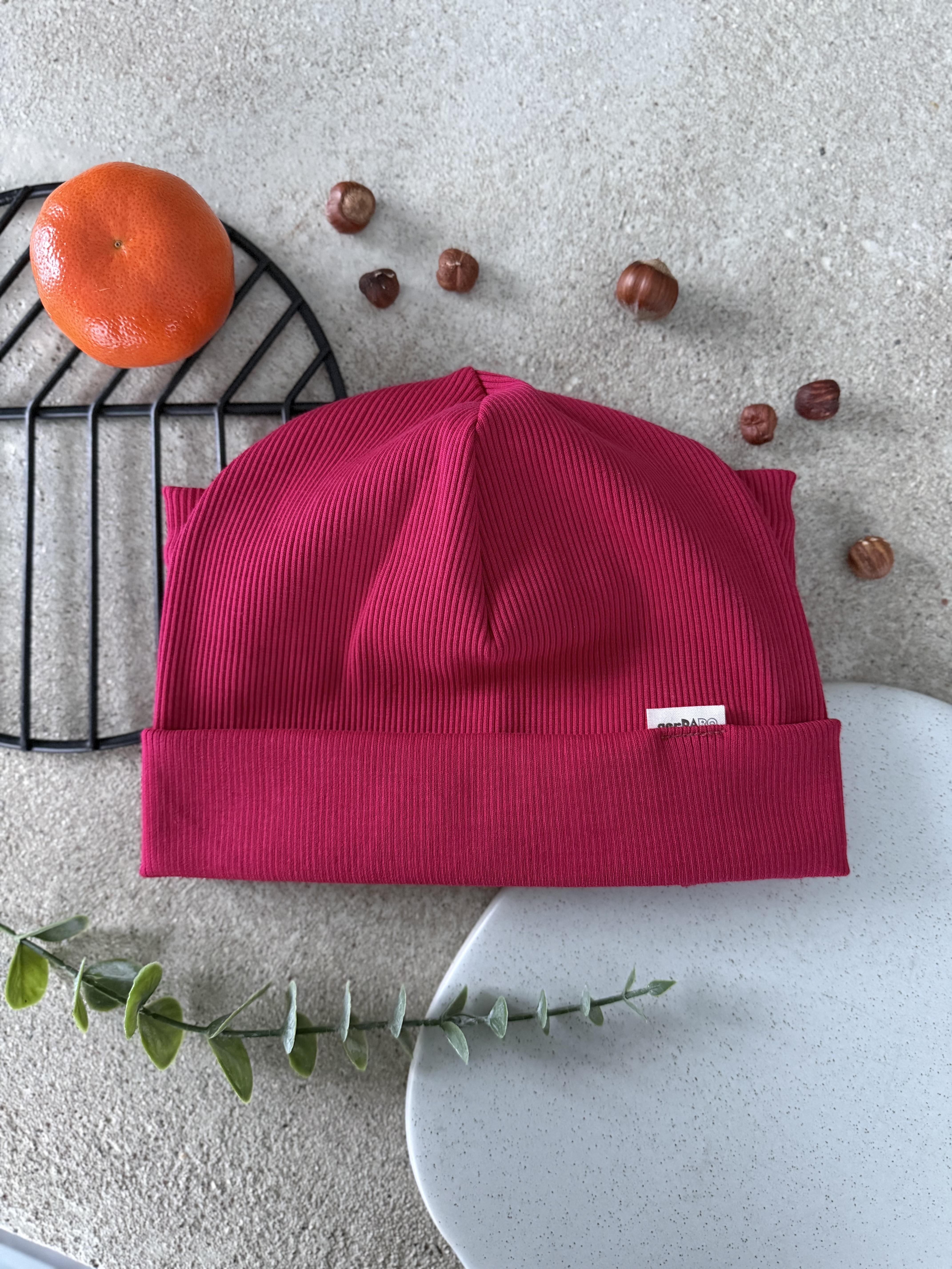 Rožinė kepurė ir mova