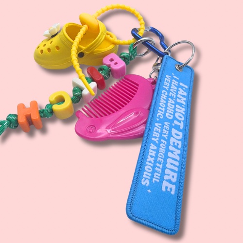 Not Demure Chaos Bag Charm