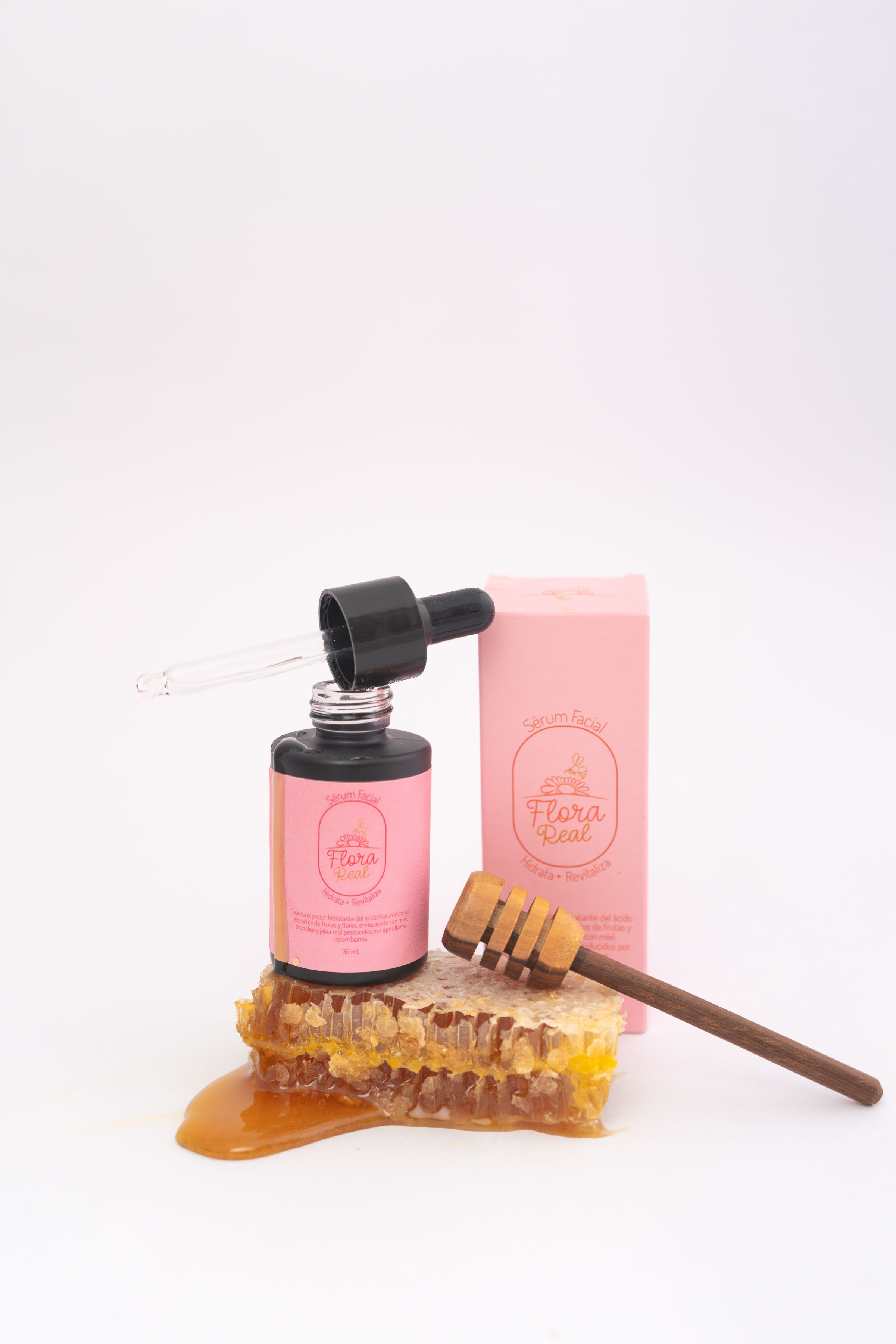 Suero hidratante para el rostro con miel, jalea real, ácido hialurónico y retinol