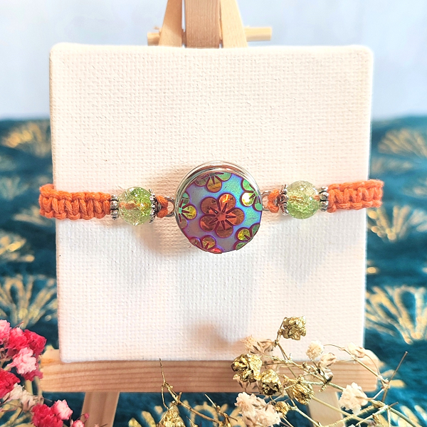 Bracelet macramé orange avec 3 bijoux pression interchangeables