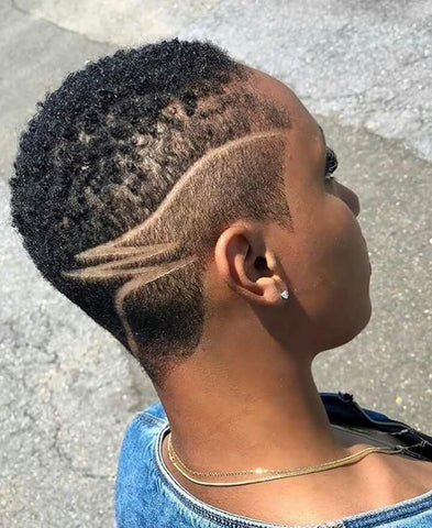 Wemen Creative Fade Haircut with Artistic Design