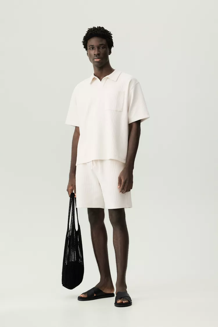 Polo estructura bolsillo