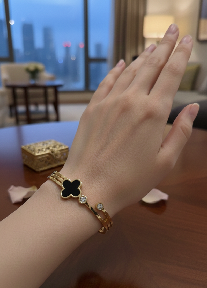 Elegant Golden Colour Anti-Tarnish Bracelet with Black Clover Design