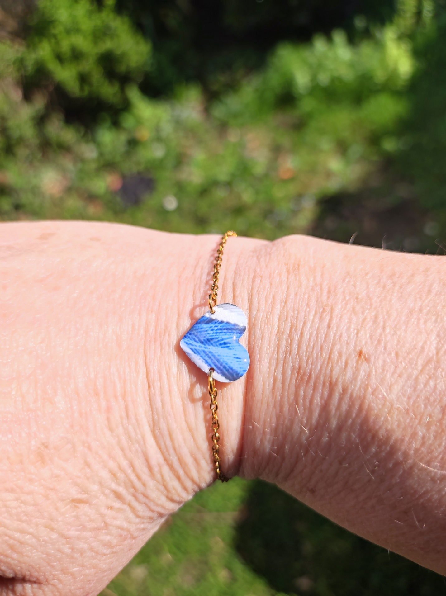 Bracelet cœur plumes bleues