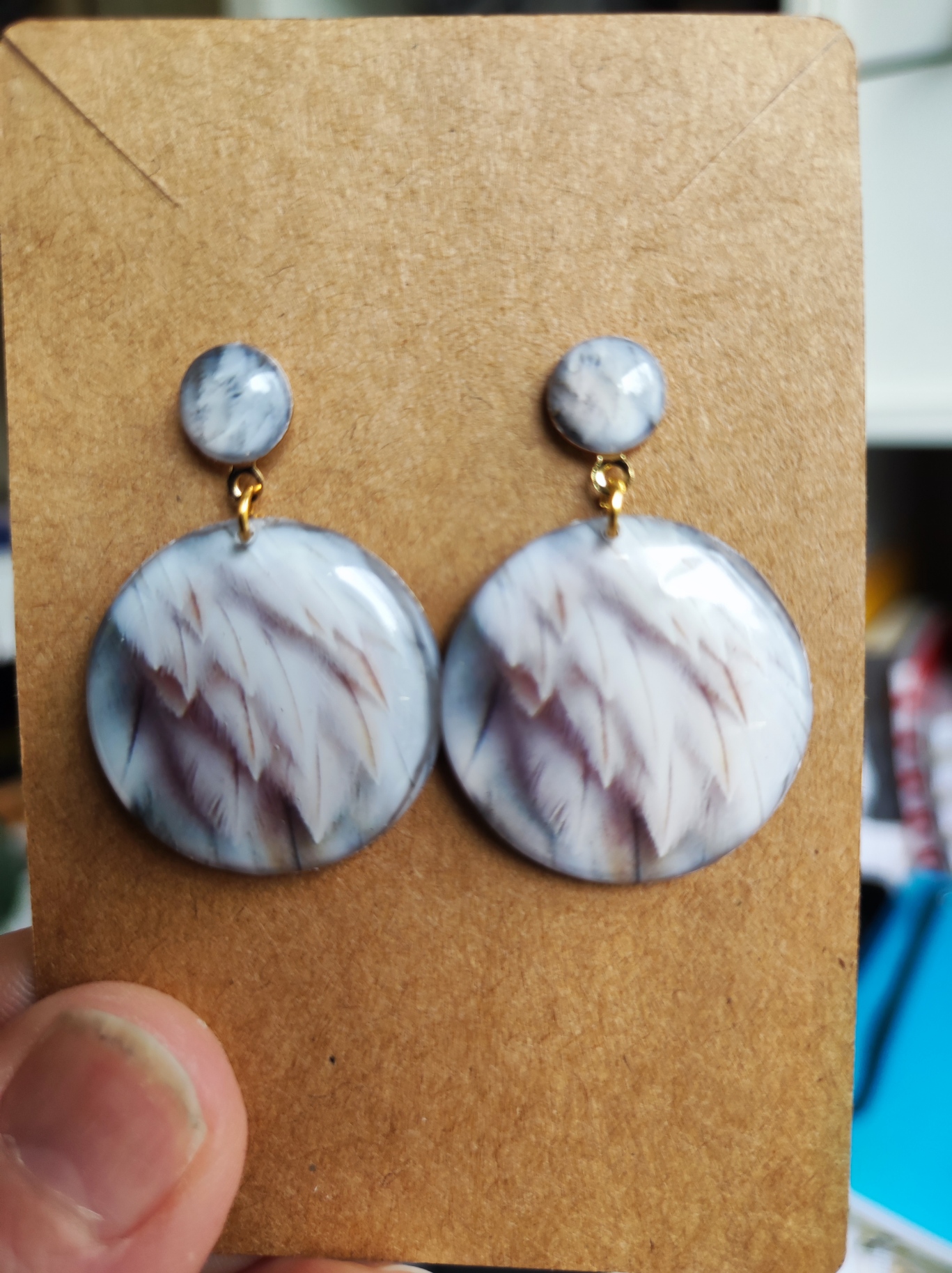 Boucles d'oreilles plumes de pélican