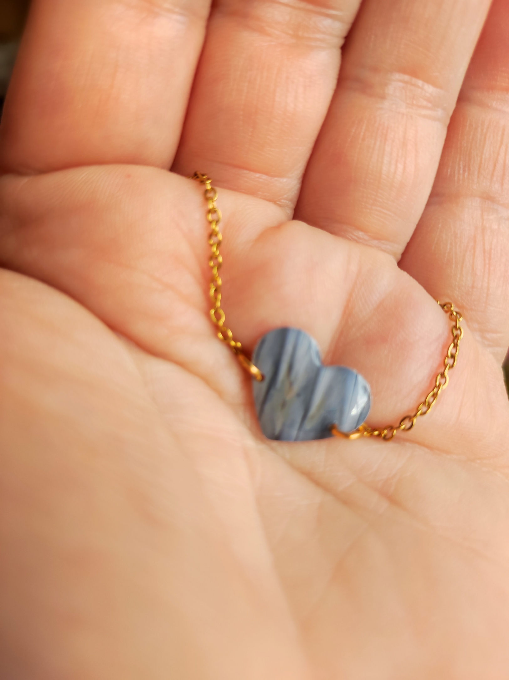 Bracelet cœur plume de pélican